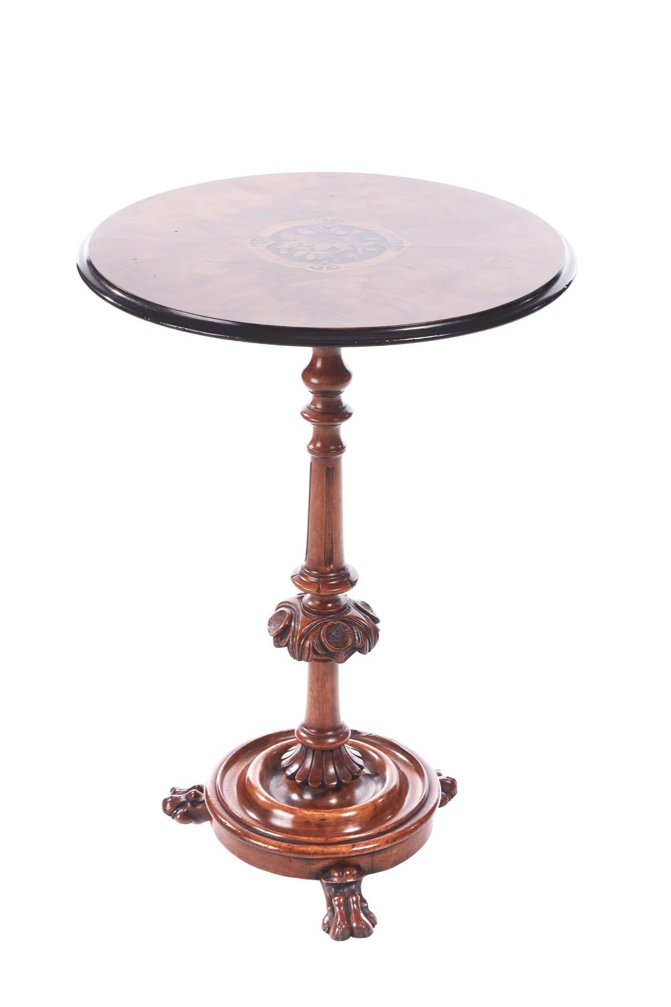 Quality antique Victorian marquetry burr walnut lamp table having a lovely burr walnut marquetry top with a thumb moulded edge. Supported by a shaped turned carved walnut column raised on a round shaped platform base with 3 carved paw feet.
Lovely