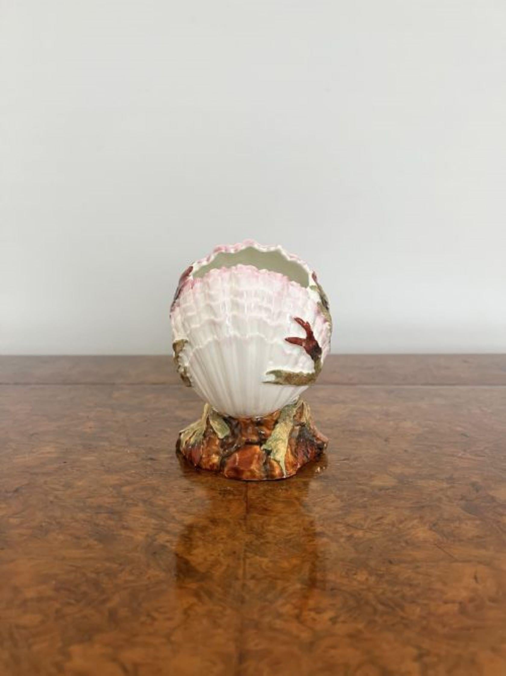 Quality antique Victorian porcelain clam vase having a quality antique Victorian porcelain clam vase hand painted in wonderful white, orange, red and green colours.