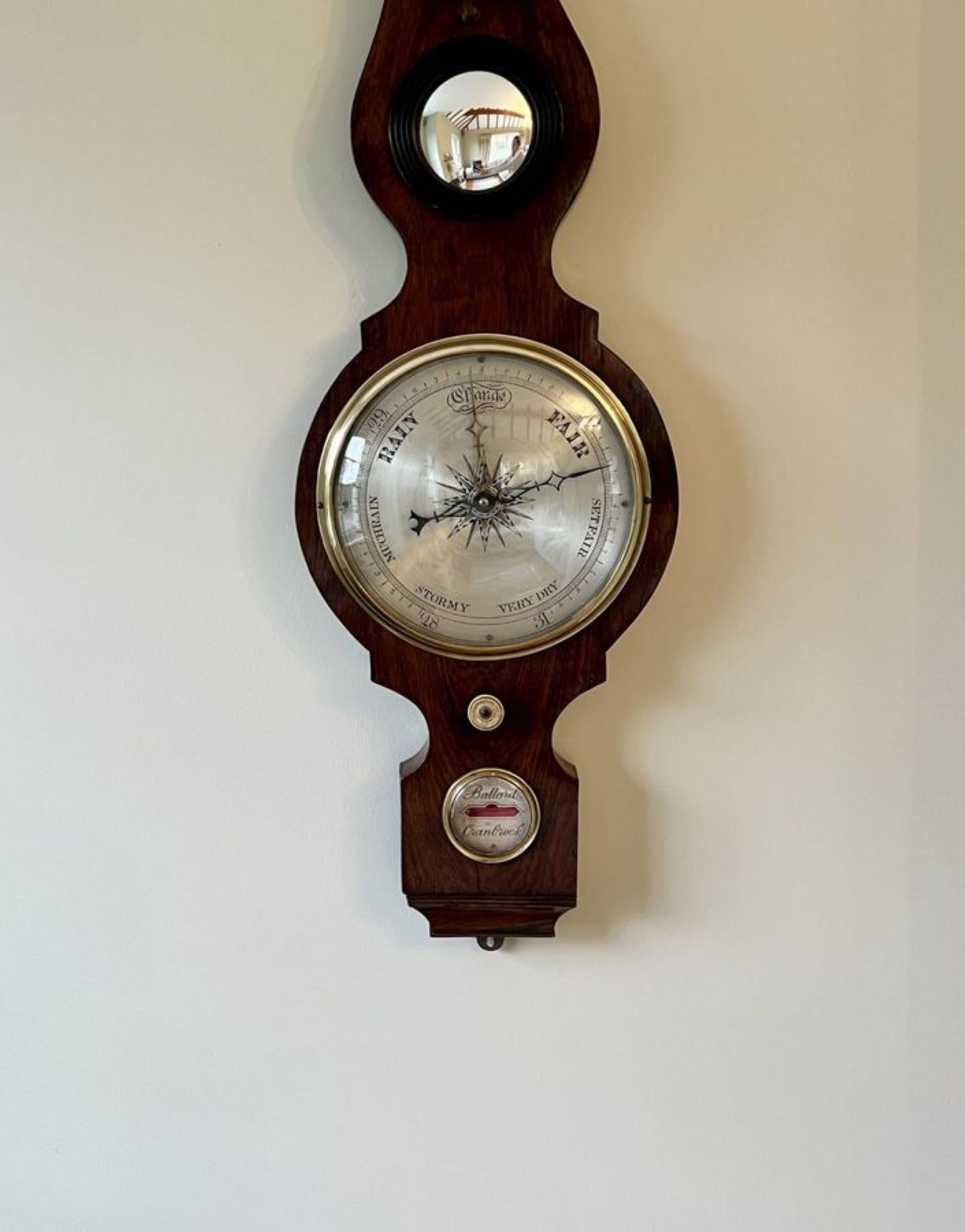 Quality antique Victorian rosewood banjo barometer, having a shaped wheel barometer by Ballard of Cranbrook, thermometer hygrometer spirit level and a circular silvered engraved dial with a brass bezel. 

D. 1880