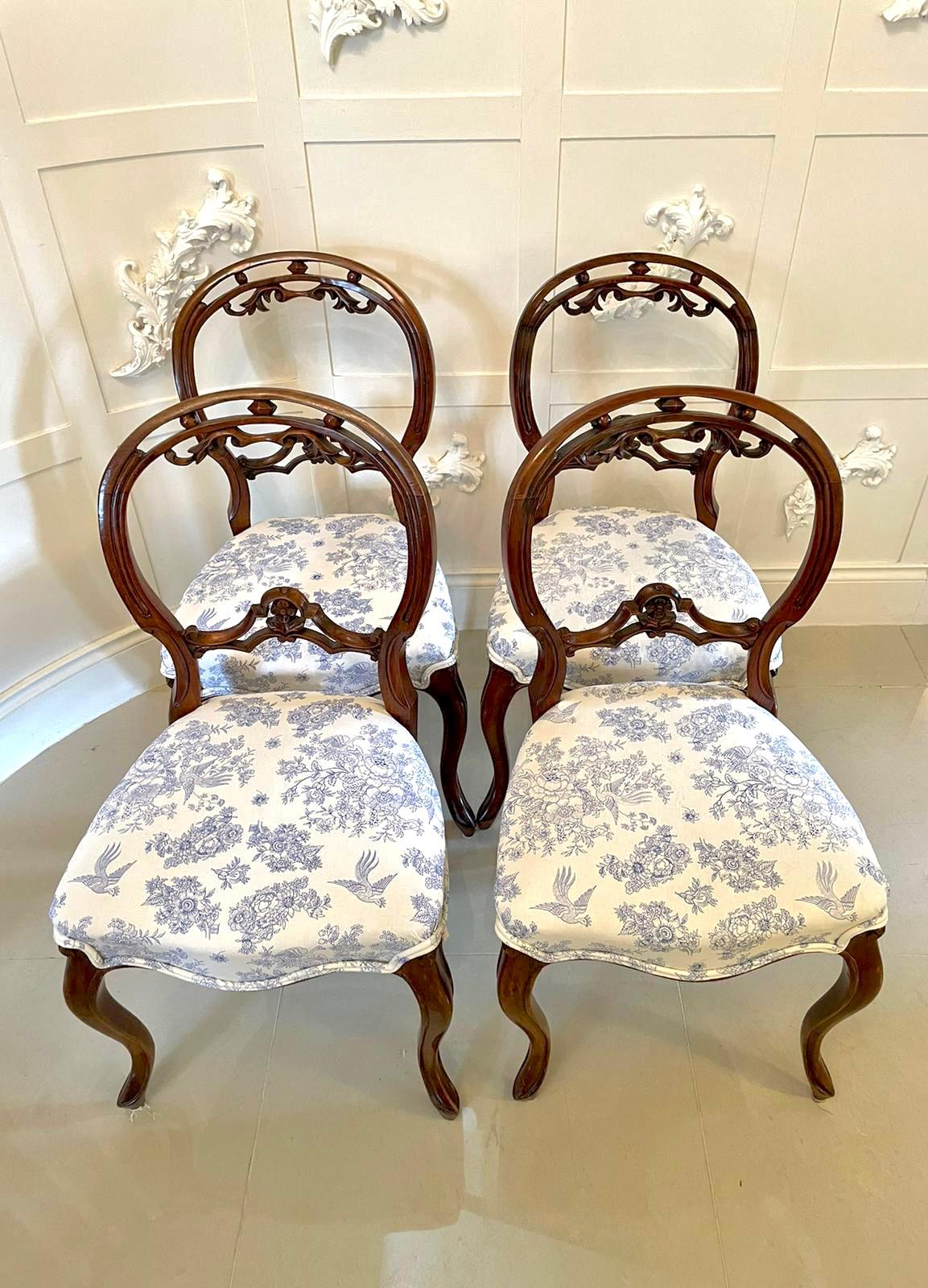 Quality antique Victorian set of four walnut dining chairs having a quality balloon back with a pretty carved top rail and a shaped carved splat to the centre, newly reupholstered serpentine shaped seats in a quality stylish fabric standing on