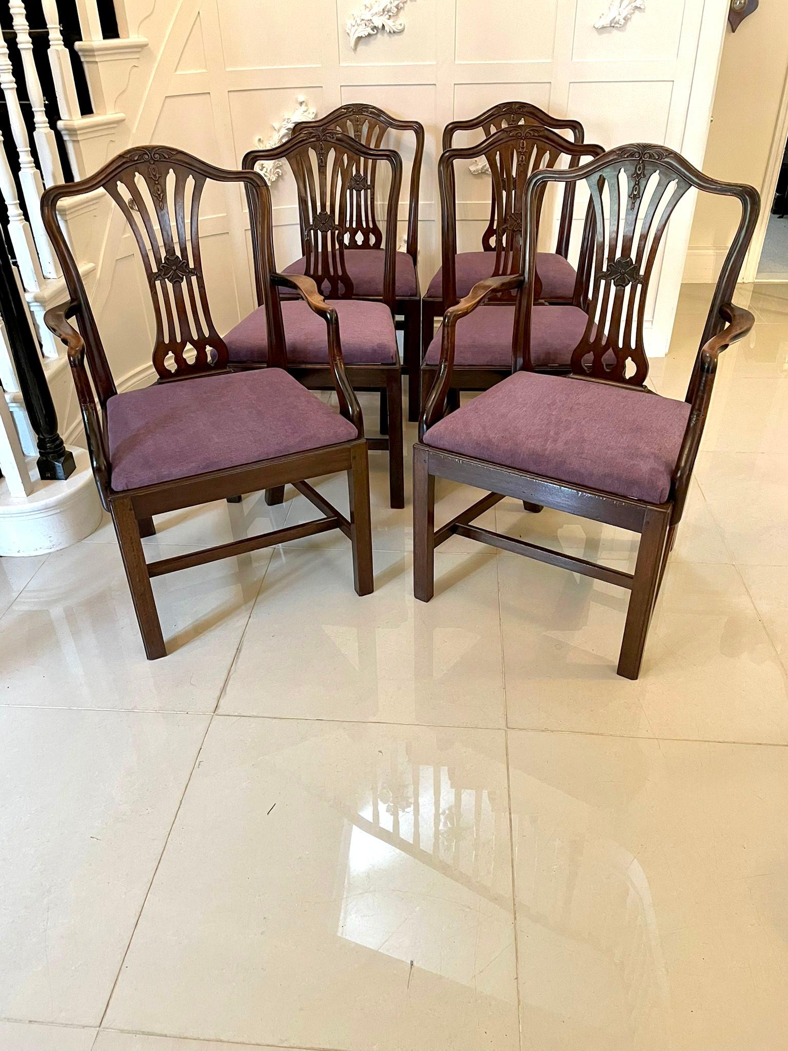 Quality antique Victorian set of six carved mahogany dining chairs consisting of two carver chairs and four side chairs having a quality carved mahogany shaped top rail, carved and pierced open splat to the centre of the back, newly reupholstered