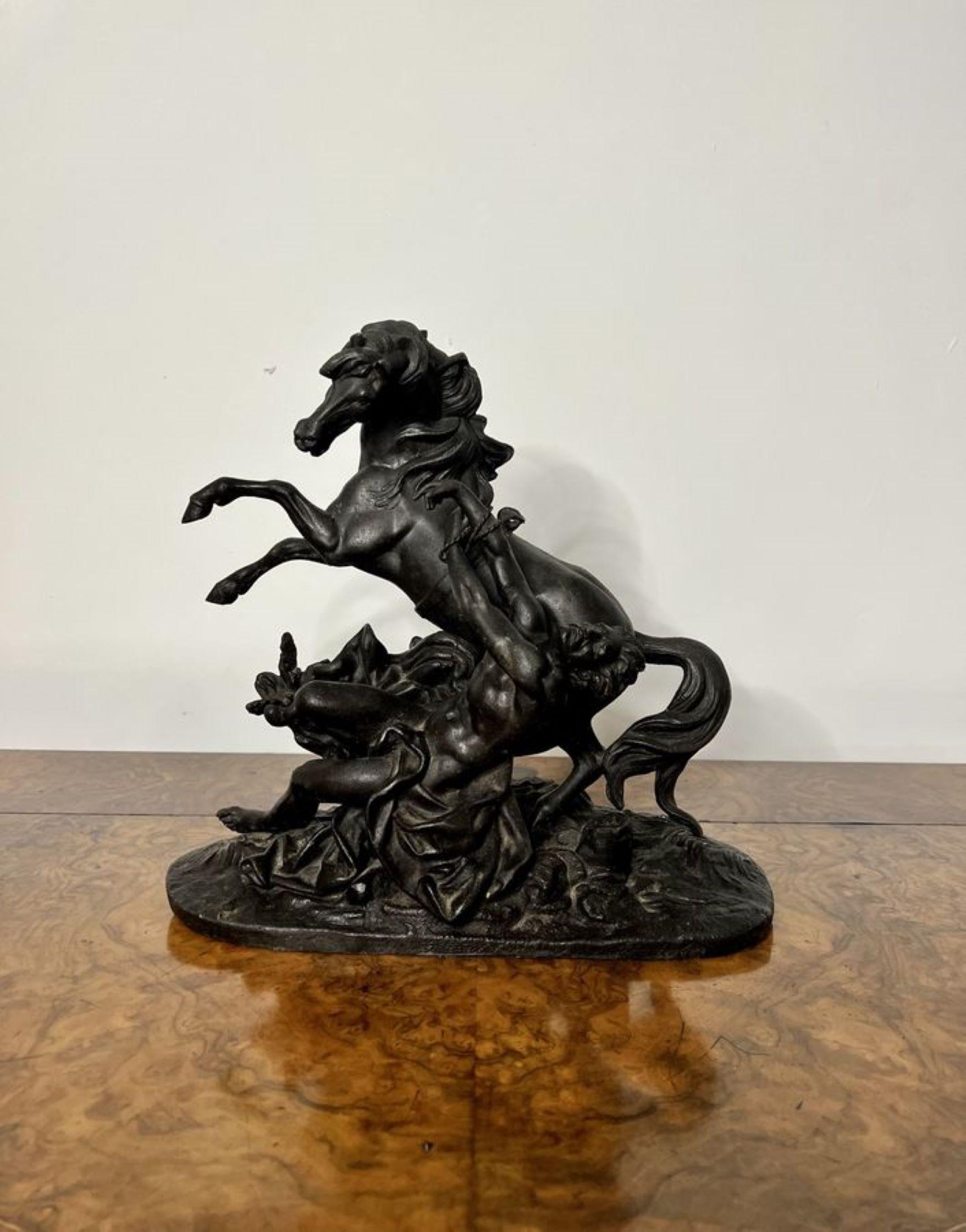 Quality antique Victorian spelter figure of a classical scene of a galloping horse and male figure surrounded by foliage on an oval base.

D. 1860