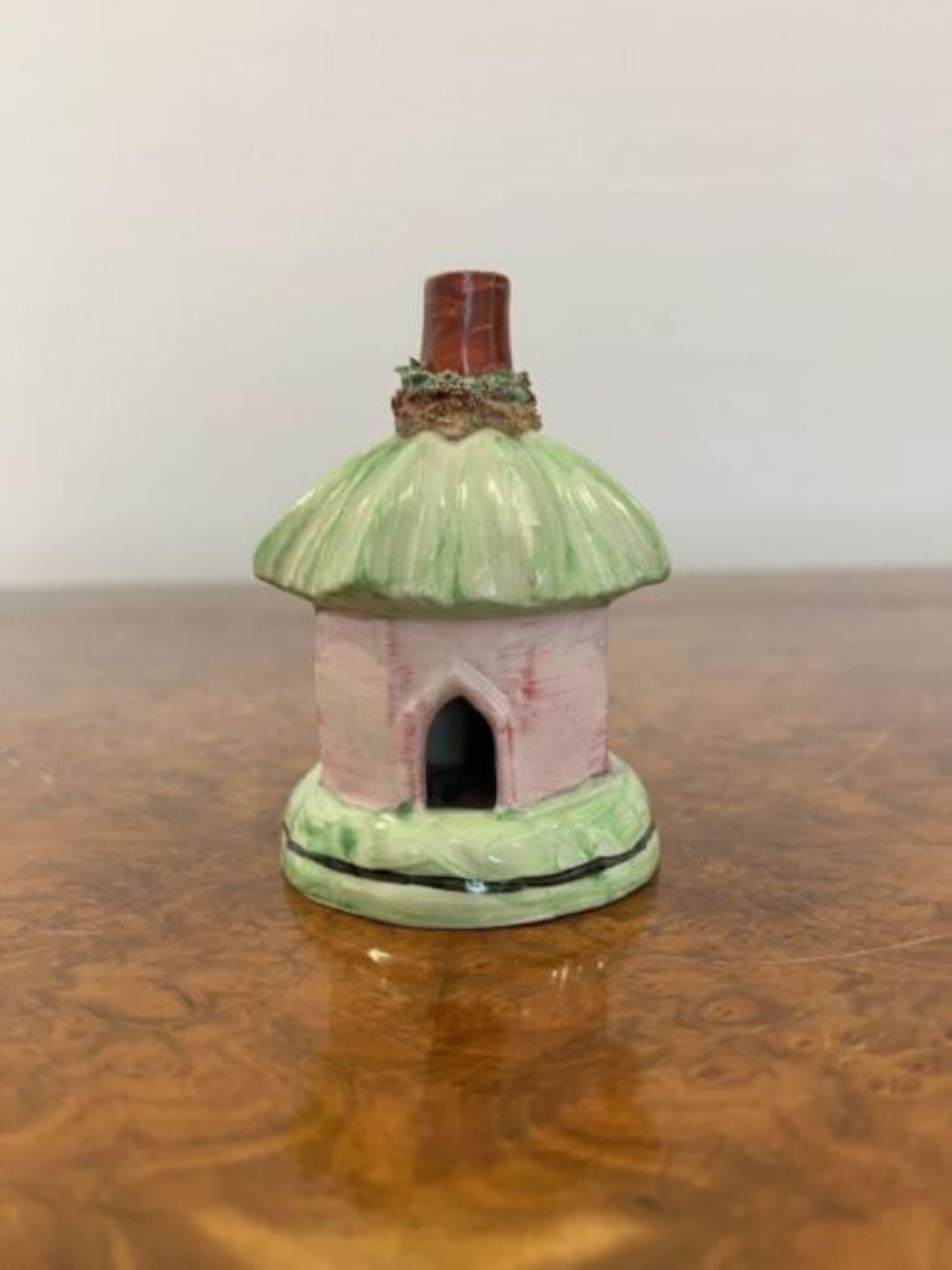 Quality antique Victorian Staffordshire cottage having a lovely model of a cottage of a circular model with an open top and back door hand painted in wonderful green, pink, white and brown colours 