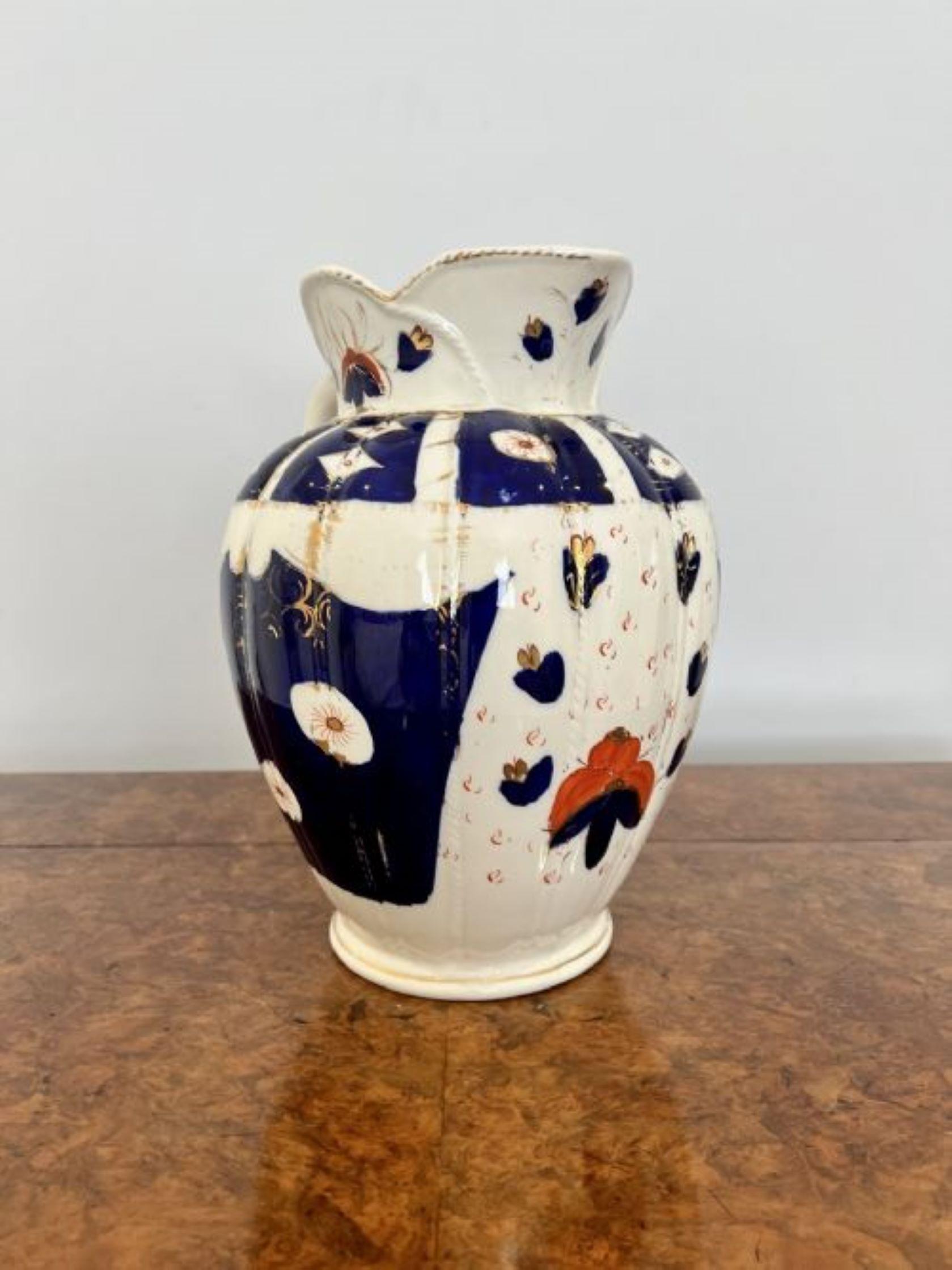 Quality antique Victorian unusual jug and bowl set having a quality unusual Victorian jug and bowl set hand painted in in wonderful cream, blue, orange and gold colours with beautiful decoration with various shaped and flowers having a shaped top
