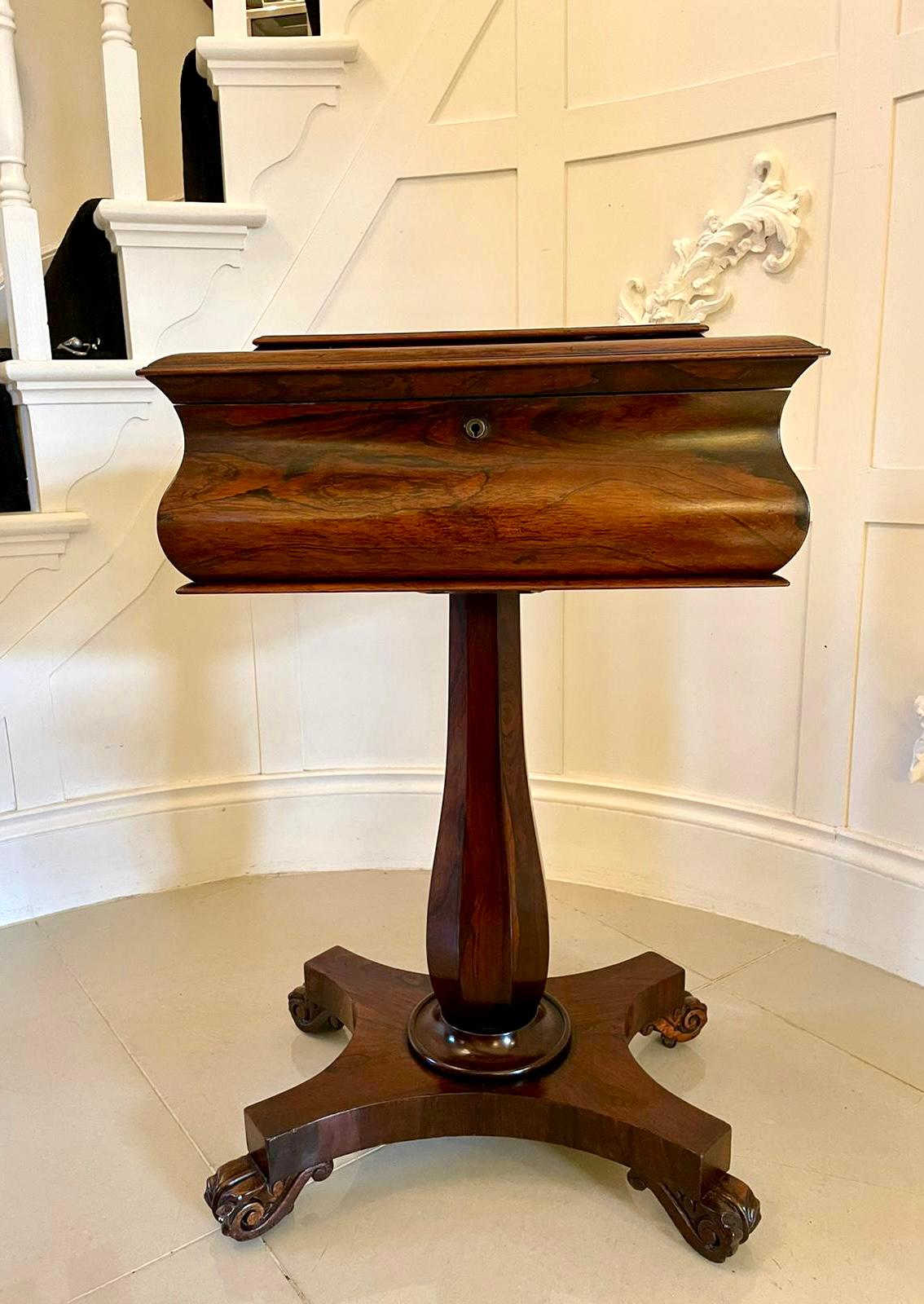 Quality antique William IV rosewood work box having a quality rosewood lift up top opening to reveal a storage compartment, shaped frieze and raised on a shaped pedestal column standing on a platform base with quality carved rosewood scrolled