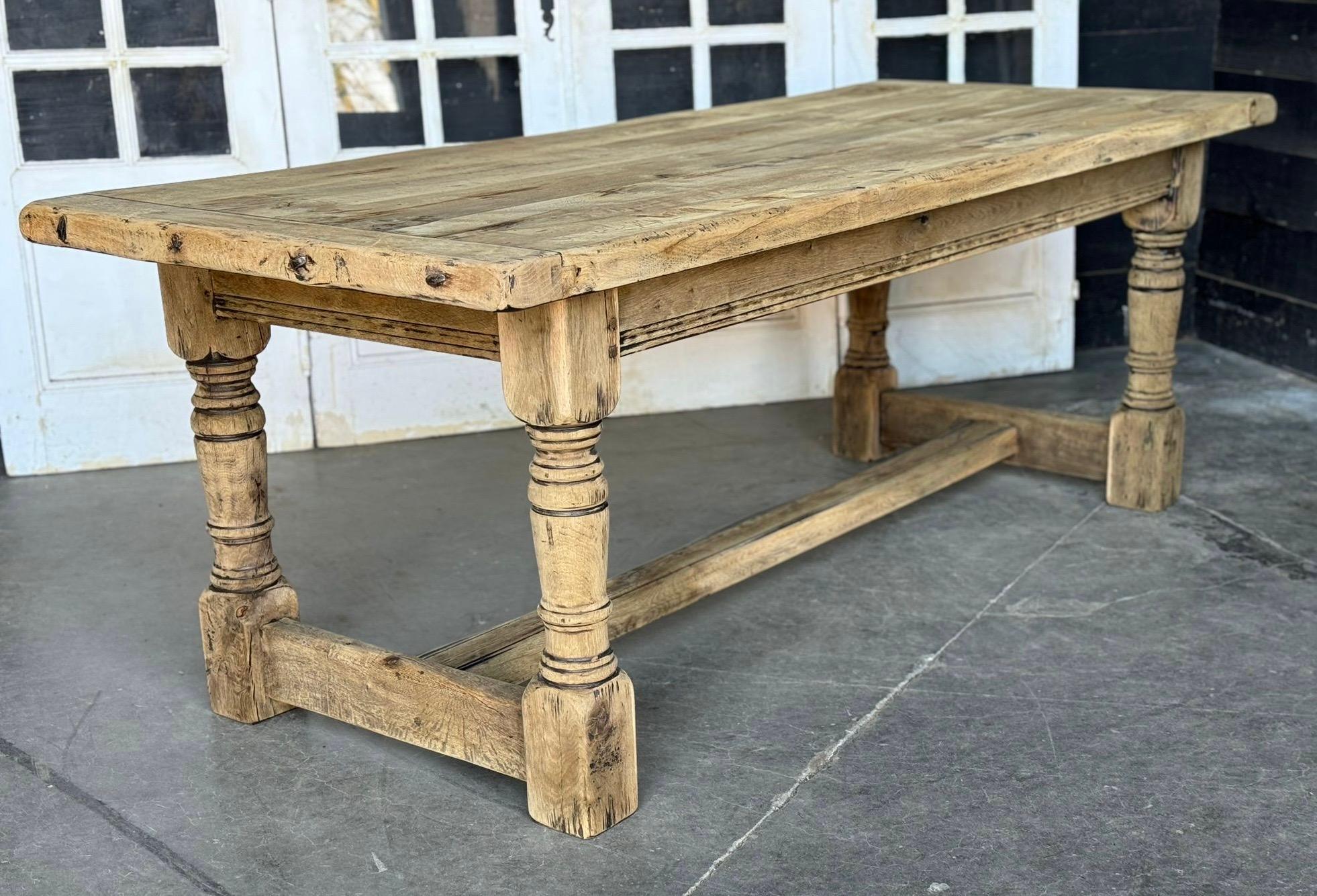 A superb quality Solid Oak Farmhouse Dining Table. Dating to early 1900s this table is of excellent construction and will be around for generations to come. Hard to find it is a good depth. We have bleached it for a lighter look and to bring out the