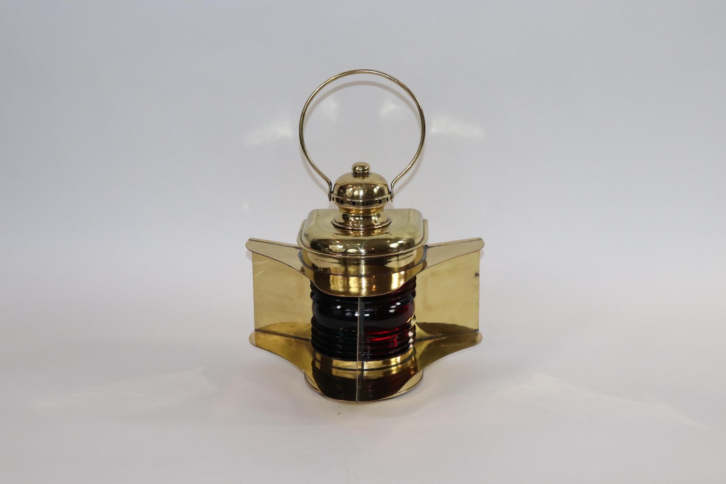 Quality ships bow lantern with red and green Fresnel glass lenses. Hinged door reads 