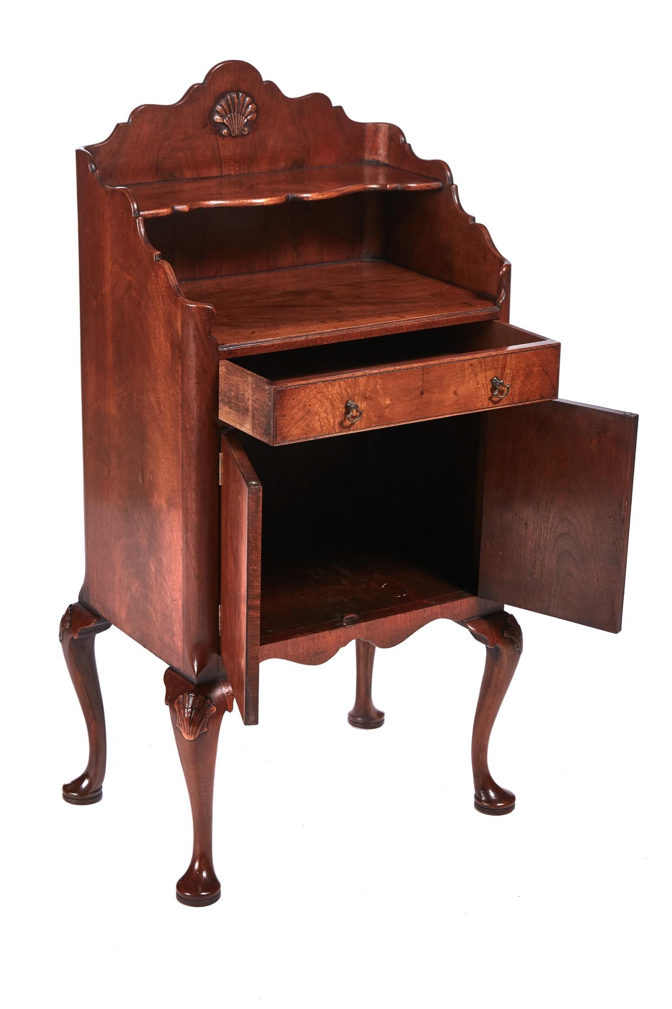 Quality burr walnut side cabinet having a lovely shaped back with carved shell, shaped shelf, one long drawer with original handles, 2 cupboard doors, shaped frieze standing on 4 shaped cabriole legs with pad feet and carved shells to the