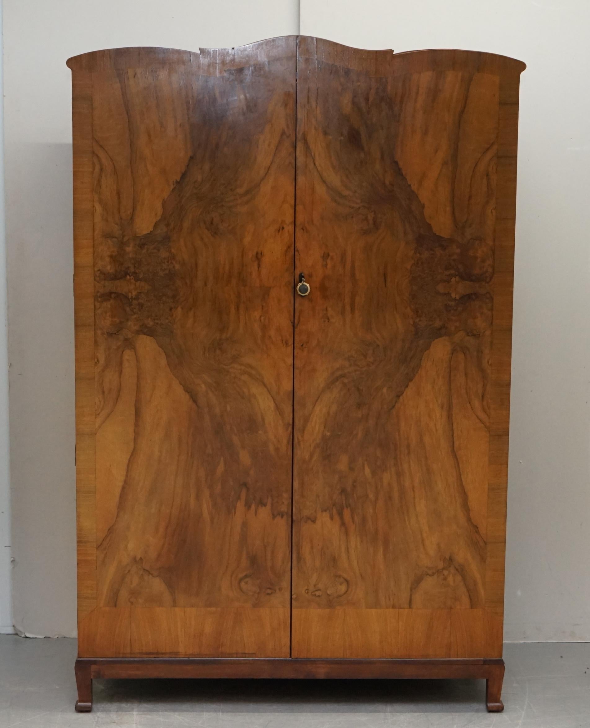We are delighted to offer for sale this stunning burr walnut vintage circa 1940's double bank wardrobe with built in mirror

This is a very good looking well made and decorative piece, the door panels have rich warm burr walnut which glows in the