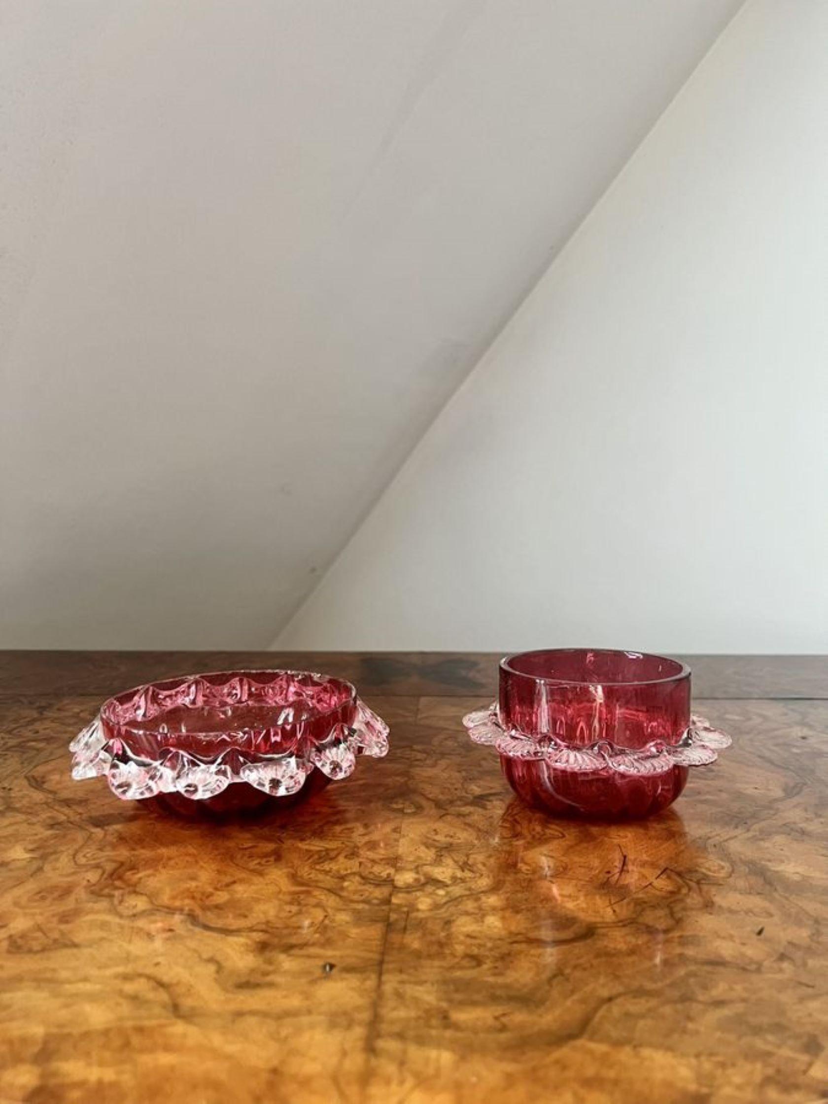 Quality collection of antique Victorian cranberry glass consisting of nine lovely cranberry glass items, four shaped jugs, two glasses and three bowls. 

D. 1880
