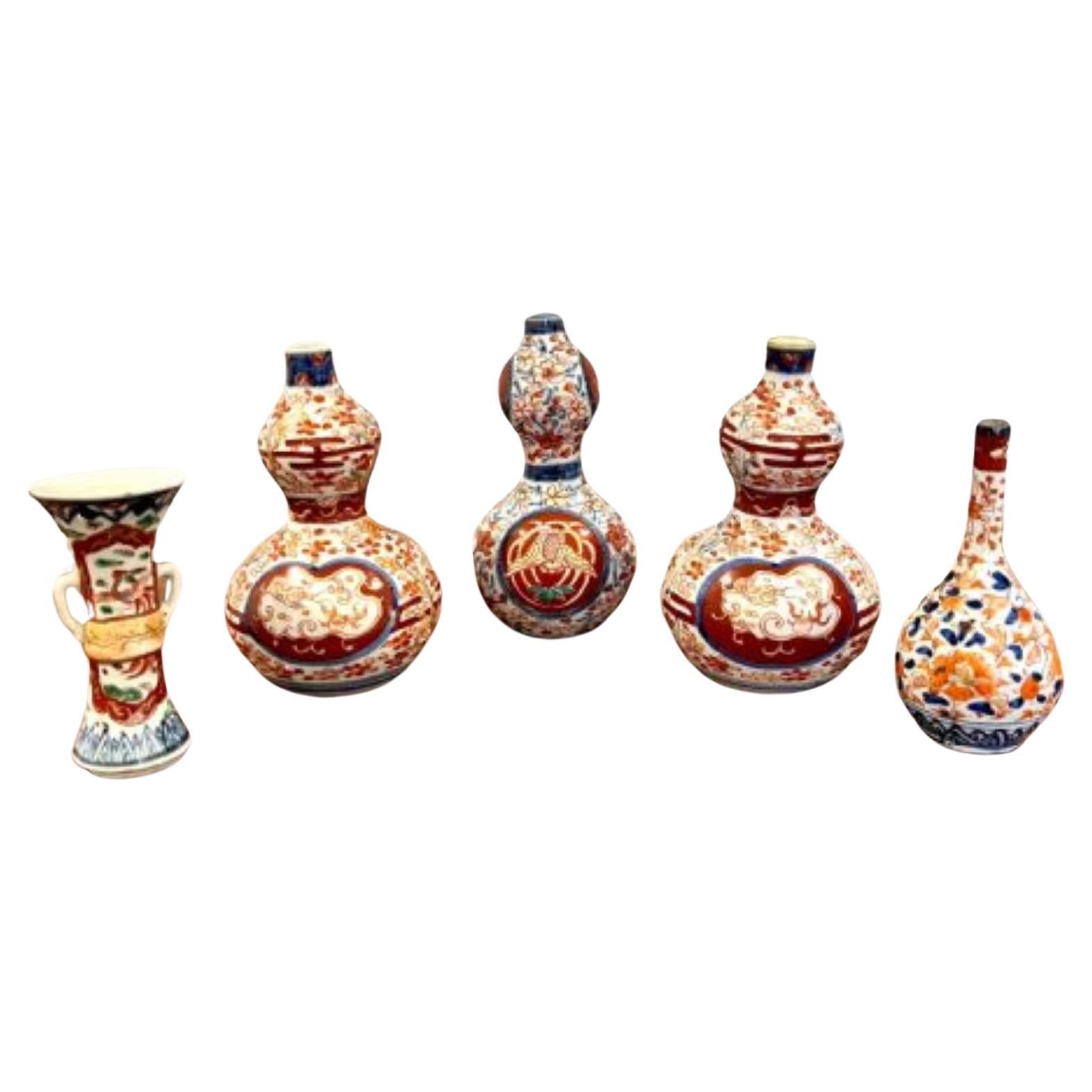 Quality collection of five small antique Japanese shaped Imari vases  For Sale