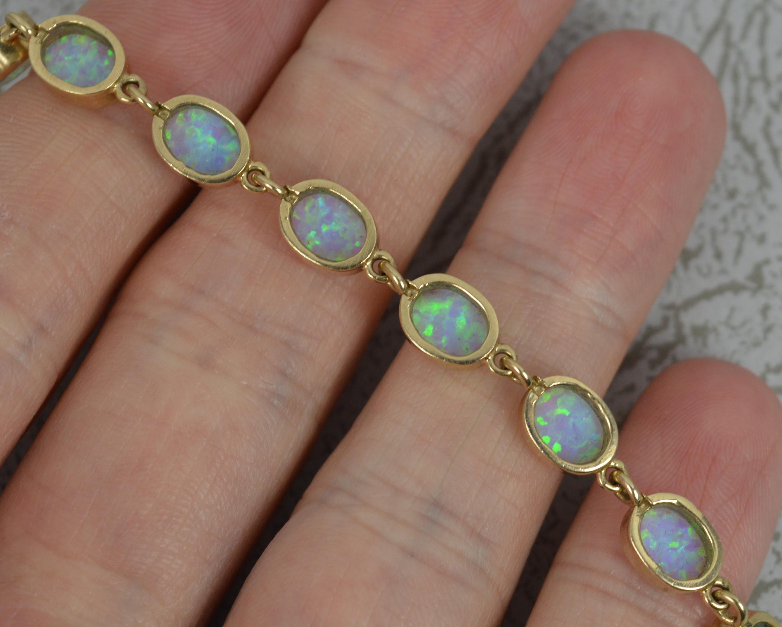 Quality Colourful Solid 9ct Yellow Gold and Opal Long Bracelet In Good Condition In St Helens, GB