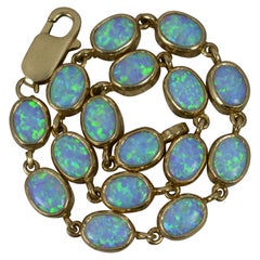 Quality Colourful Solid 9ct Yellow Gold and Opal Long Bracelet