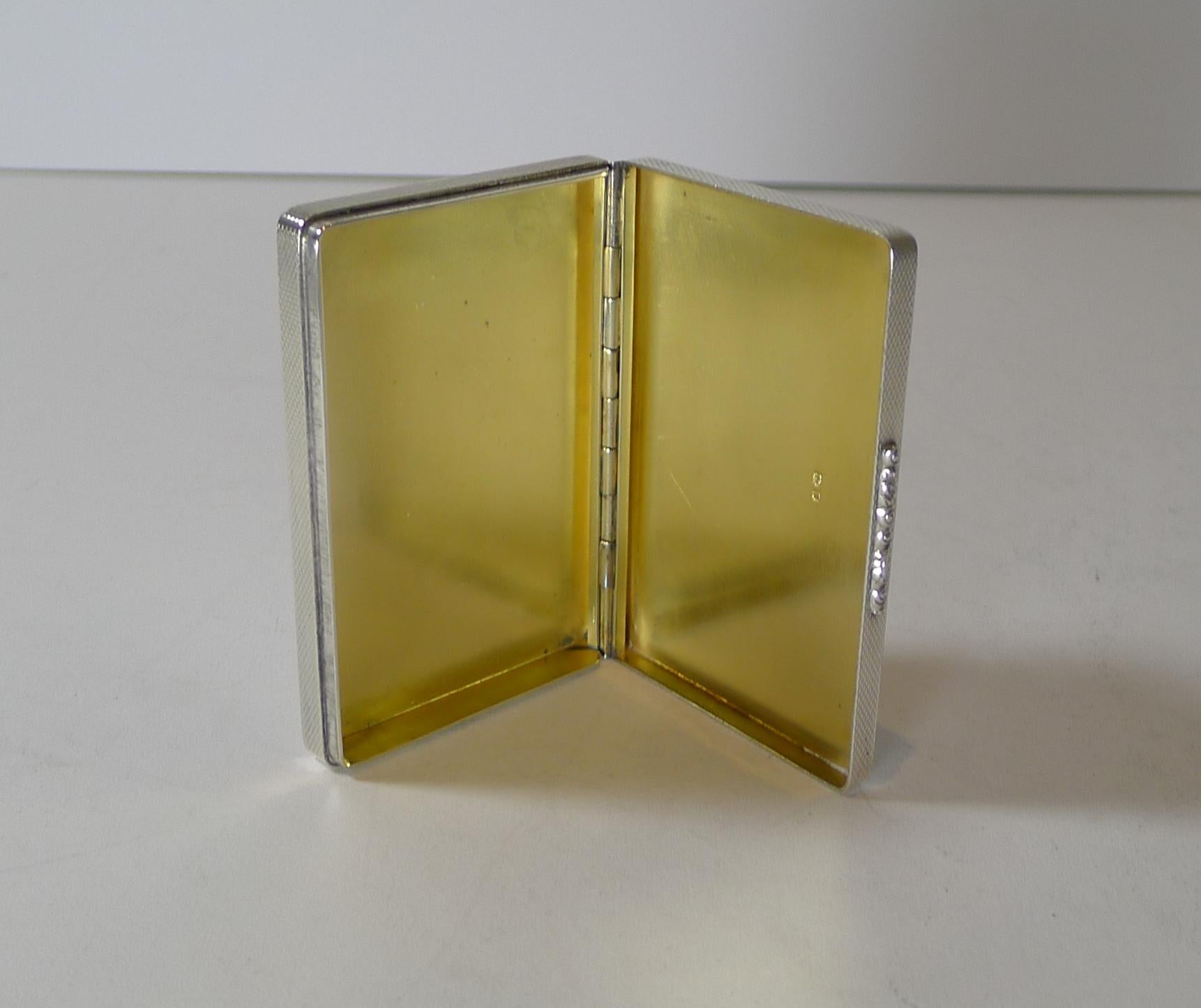 A top quality late Art Deco box made from solid English sterling silver, a large pill box / snuff box, or would make a great business card case (a custom smaller sized card would have to be made which these days is easy).

This heavy box weighing