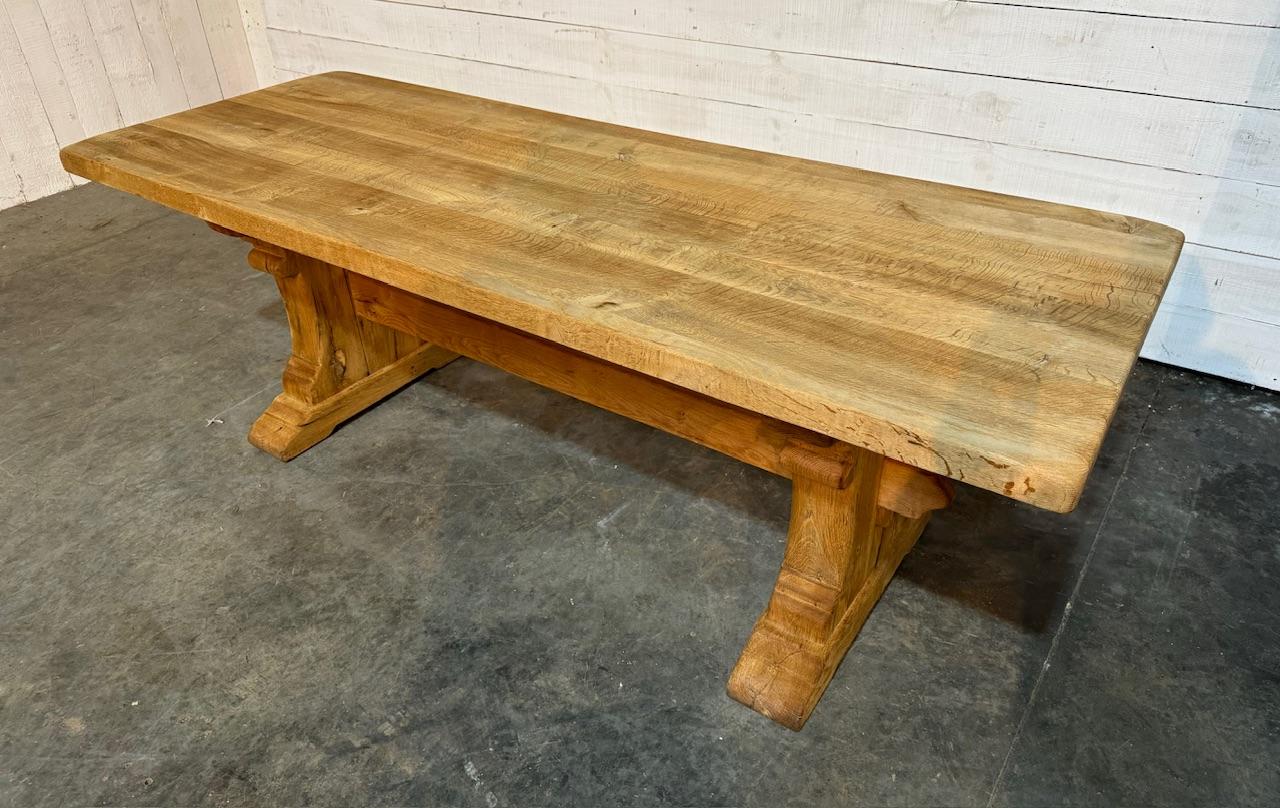 A very good quality Solid Oak Farmhouse Trestle End Dining Table. Made from Solid Oak and French in origin, of excellent quality construction this table will be around for generations to come. We have bleached it for a lighter look and to bring out