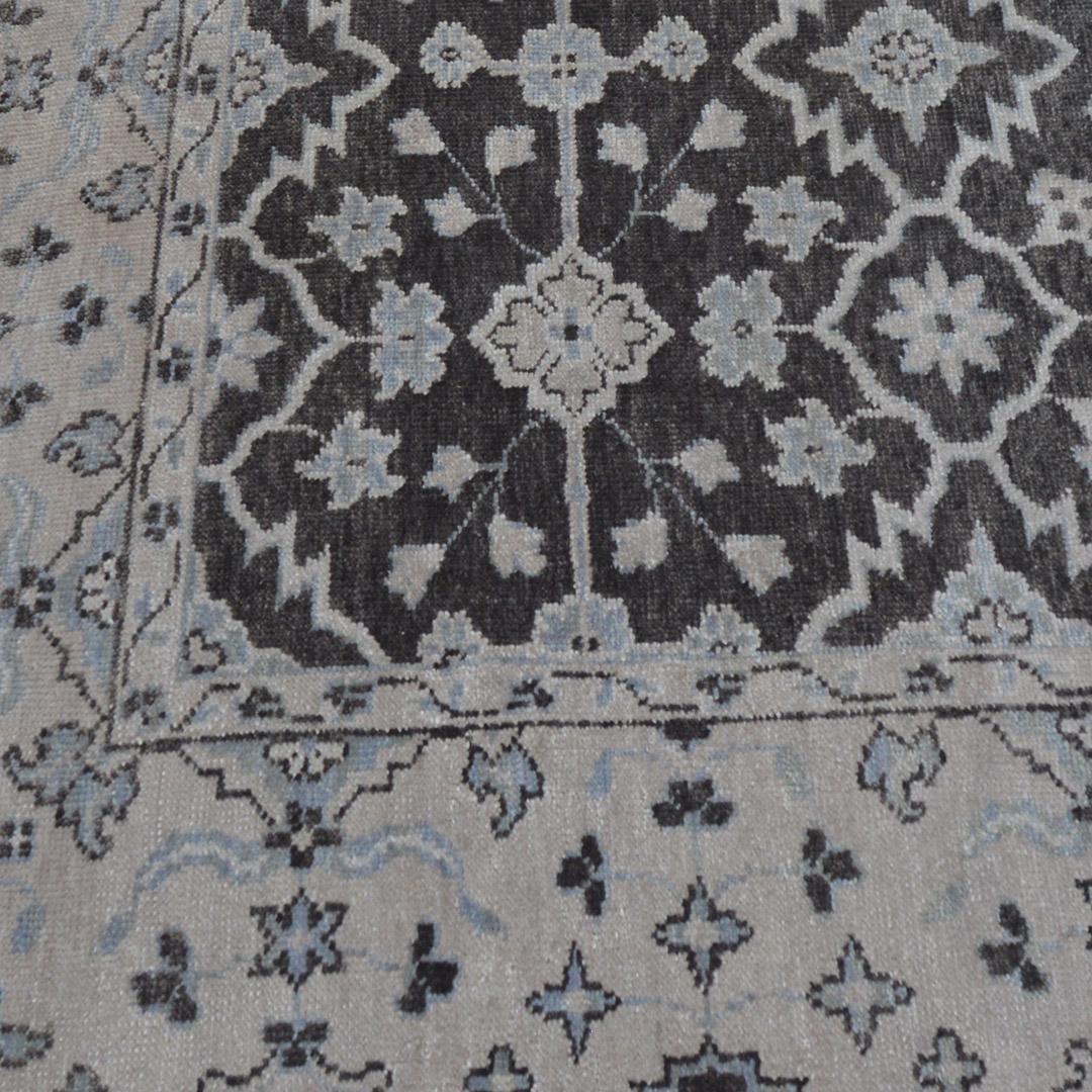 Skillfully created in Kashmir, this beautiful Oushak features a soothing brown color field and an exceptionally decorative design. 100% natural wool pile.
