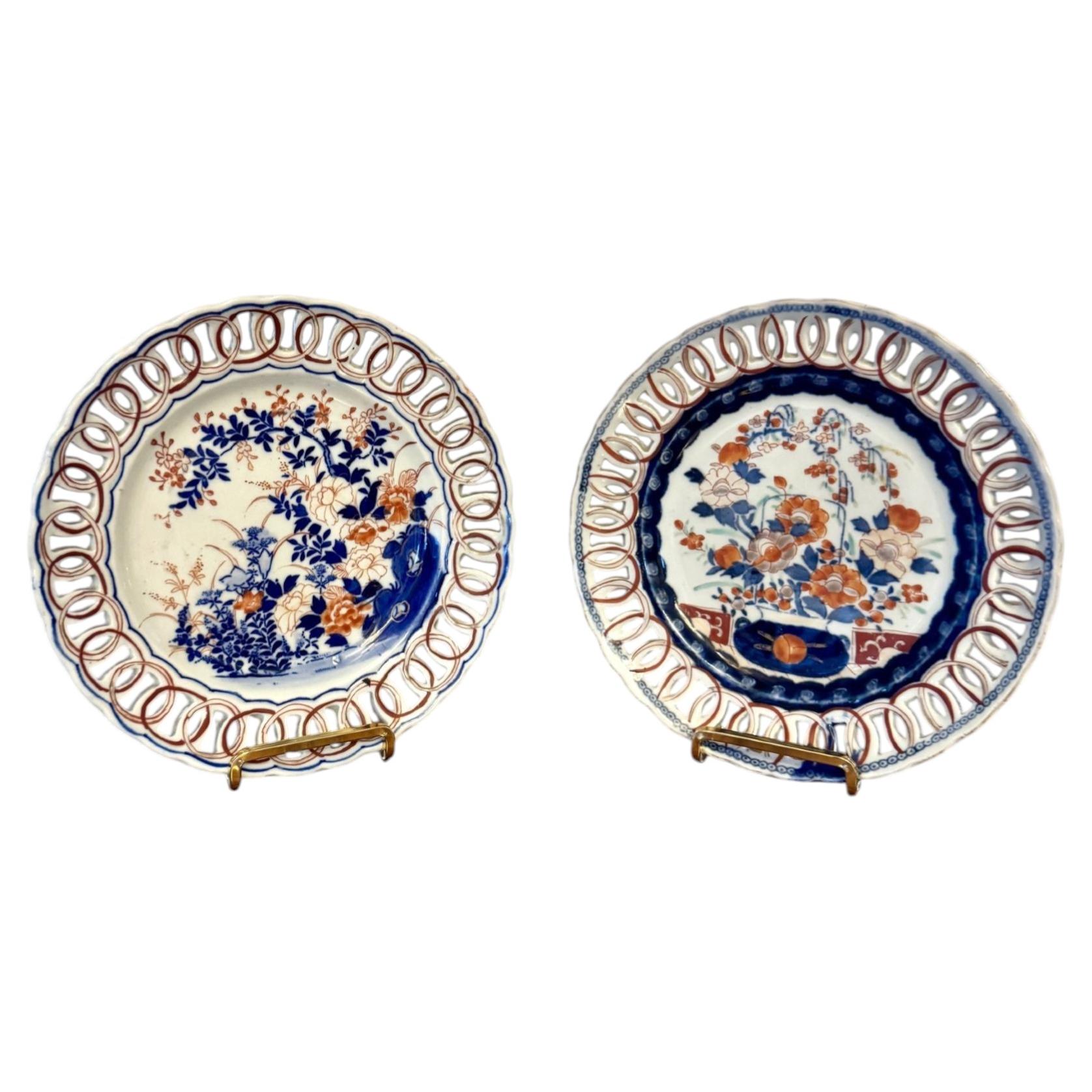 Quality near pair of antique Japanese imari plates
