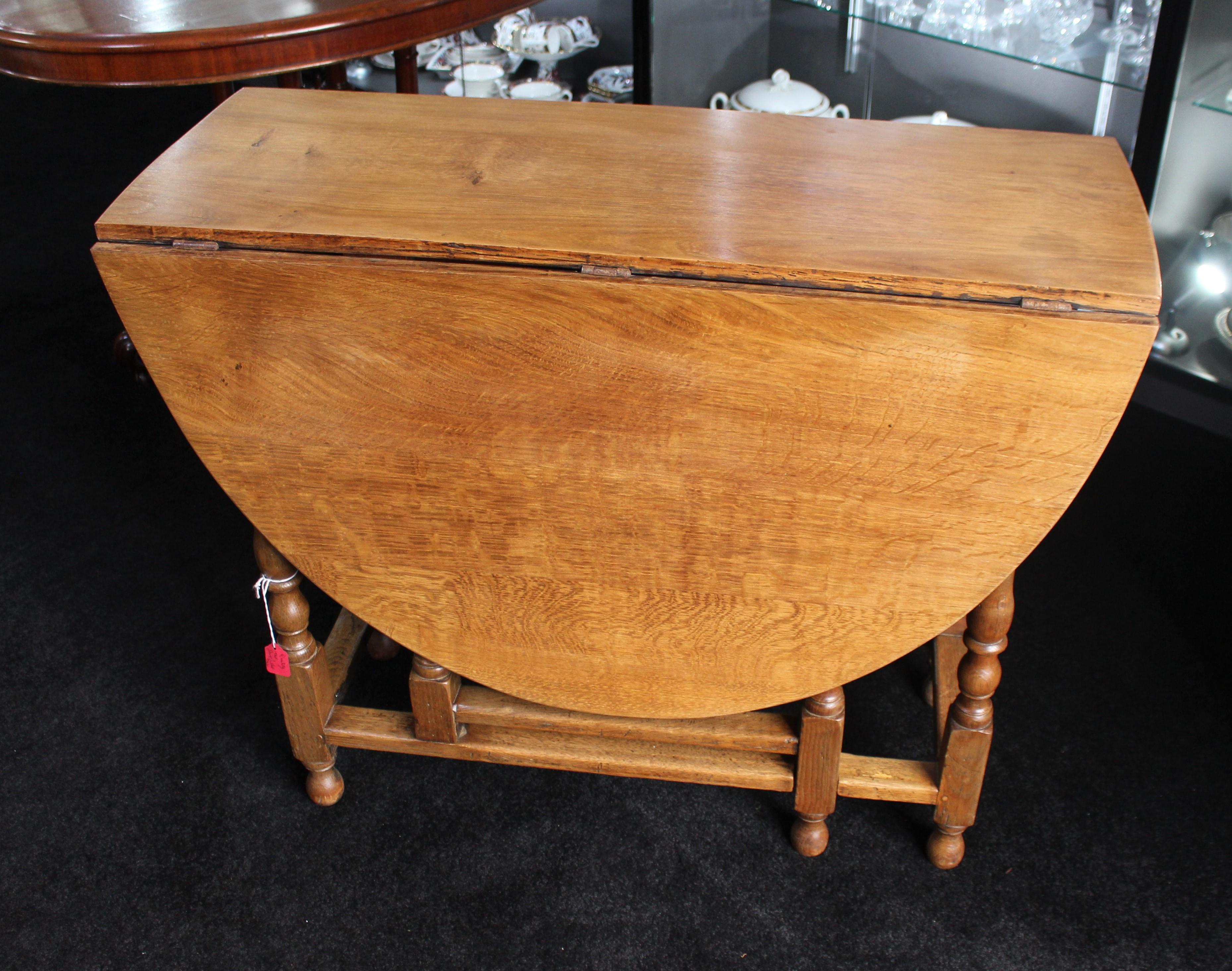 Quality oak gateleg dining table


Measures: Length: 92 cm.

Width: 38 cm (leaves down), 134.5 cm (leaves up)

Height: 73 cm


Gateleg table

20th century

Oak

A few minor marks to wood only. Very solid and attractive mellow
