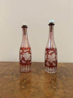 Quality pair of antique Edwardian ruby glass decanters