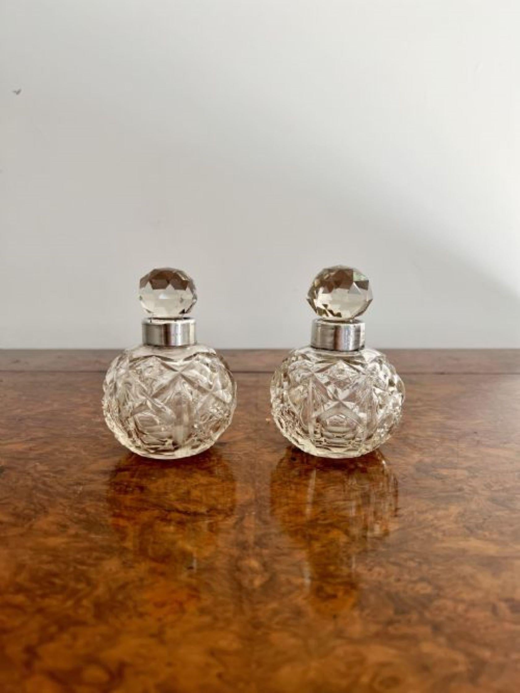 Quality pair of antique Edwardian silver collar & cut glass scent bottles having a lovely quality pair of scent bottles, with a cut glass detailed body, silver collar and the original cut glass stopper. 