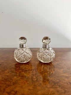 Quality pair of antique Edwardian silver collar & cut glass scent bottles