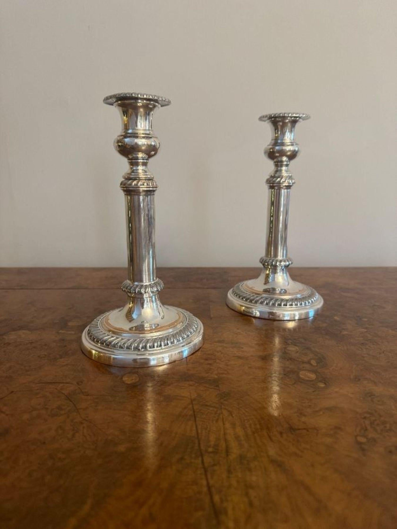 Quality pair of antique Regency telescopic Sheffield plated candlesticks having a quality pair of antique Regency telescopic Sheffield plated candlesticks with an ornate turned column on a circular stepped base. 
Hight extended 28cm

D. 1830