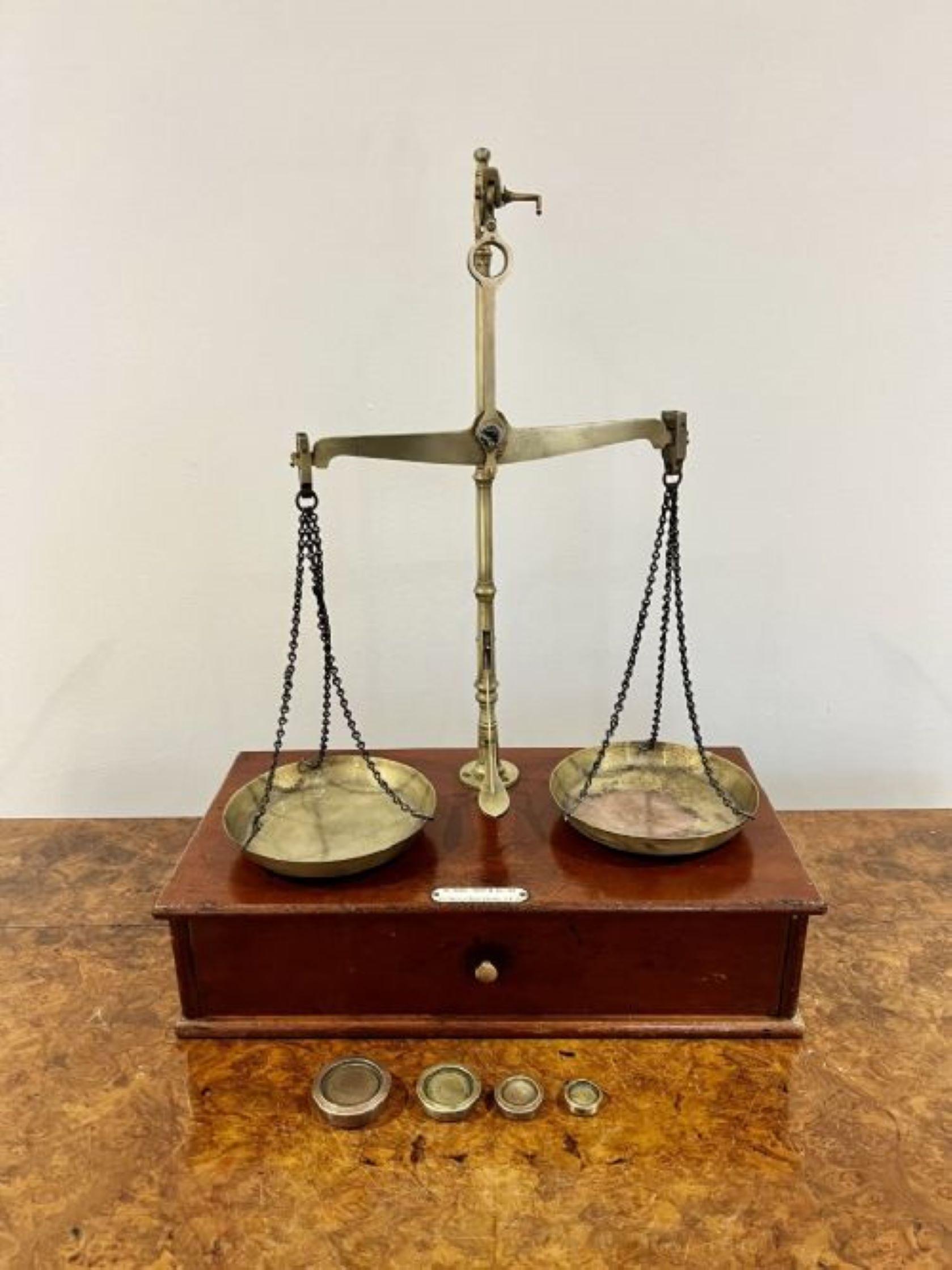 Quality pair of antique Victorian brass beam scales with the original weights, bearing makers label for De Grave, Short & Co, London