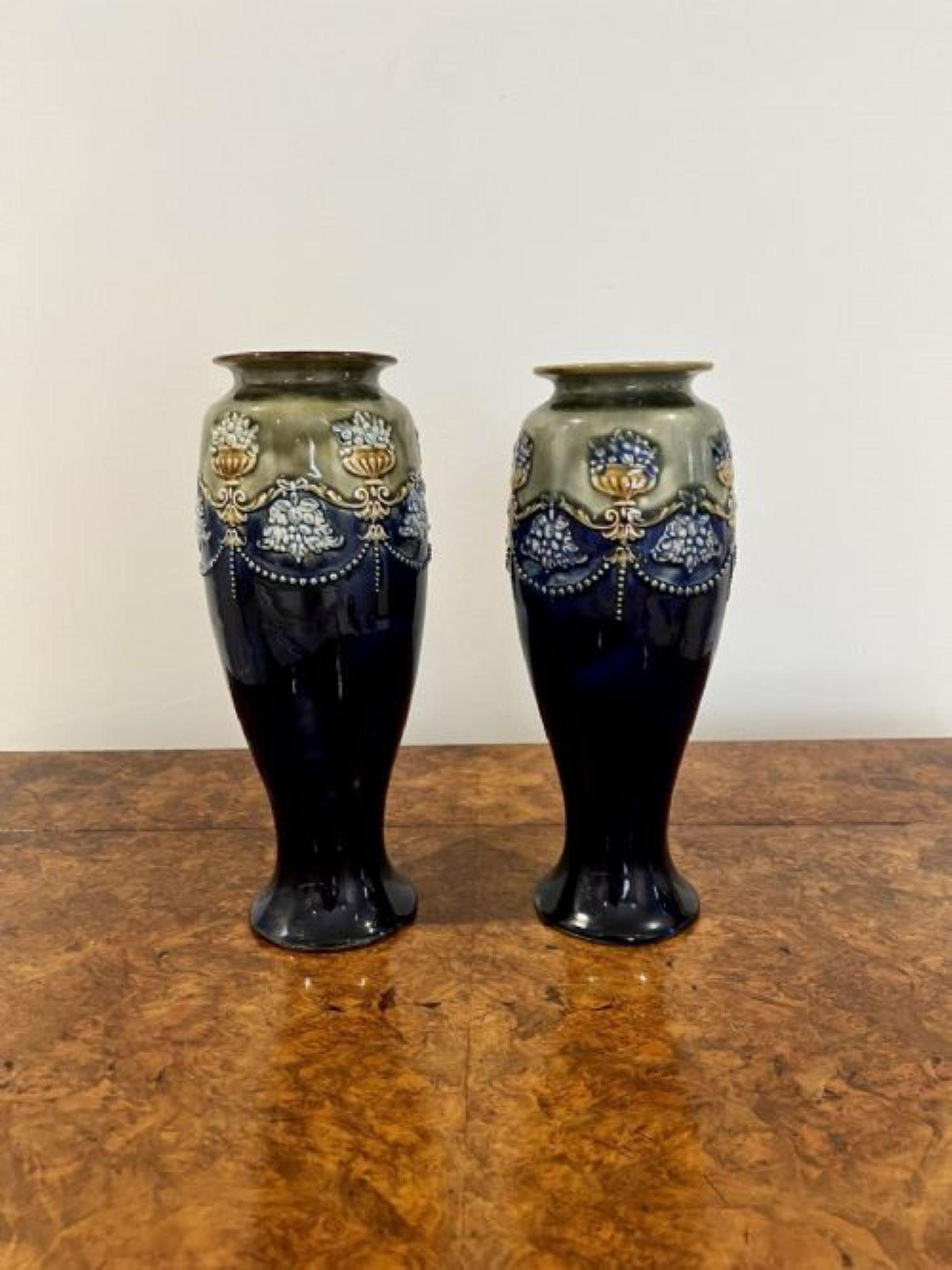 quality pair of antique Victorian Royal Doulton vases, having a quality pair of salt-glazed stoneware vases in wonderful blue and green glaze with raised swags, both with impressed marks to the base as shown 