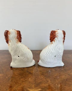 Quality pair of antique Victorian seated spaniels