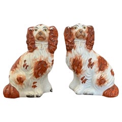 Quality pair of antique Victorian seated spaniels