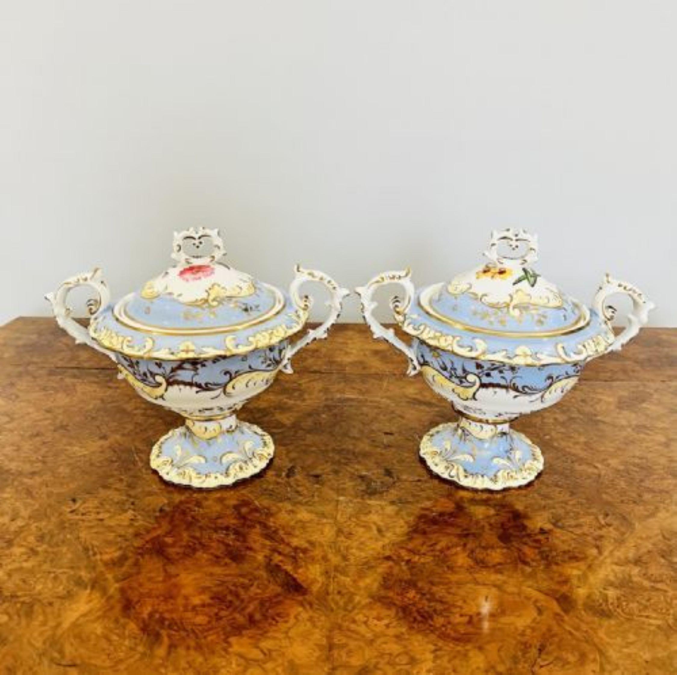 Quality Pair of Chamberlains Worcester sauce tureens and covers having scroll moulded pierced finials above foliate decorated domed lids with blue, white and gilt bodies and gilt acanthus leaf moulded handles raised on flared feet. 