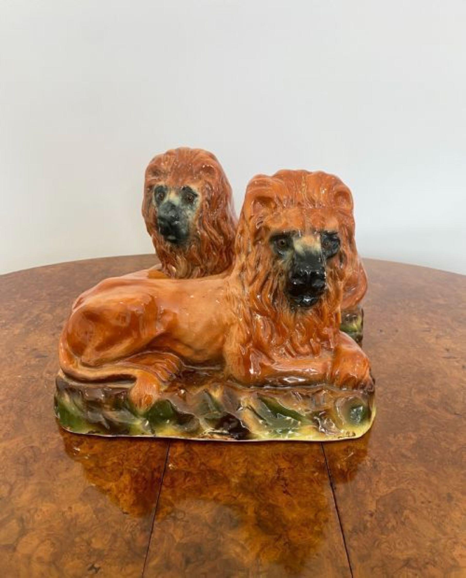 Quality pair of large antique Victorian Staffordshire lions For Sale 1