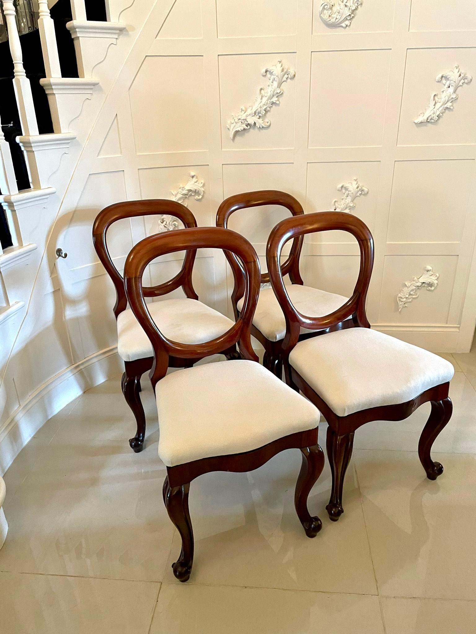 Quality set of four antique Victorian mahogany dining chairs having a quality mahogany shaped balloon back, serpentine fronted drop in seat with a shaped mahogany freeze standing on shaped cabriole legs with elegant scroll feet to the front and out
