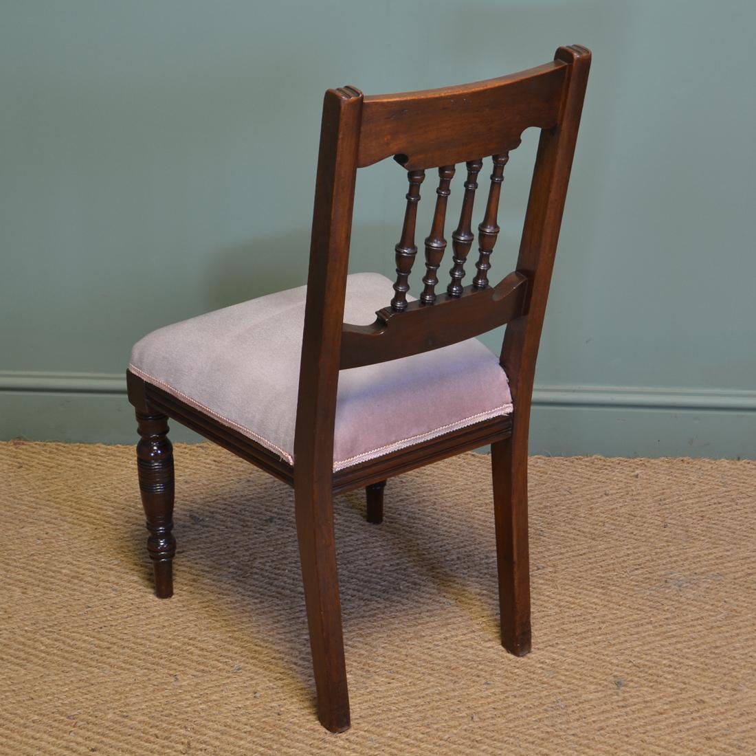 Quality set of four Victorian walnut antique dining chairs

With Arts & Crafts influences and dating from circa 1880, this quality set of chairs have curved beautifully carved backs with a central turned back support. They stand on splayed back