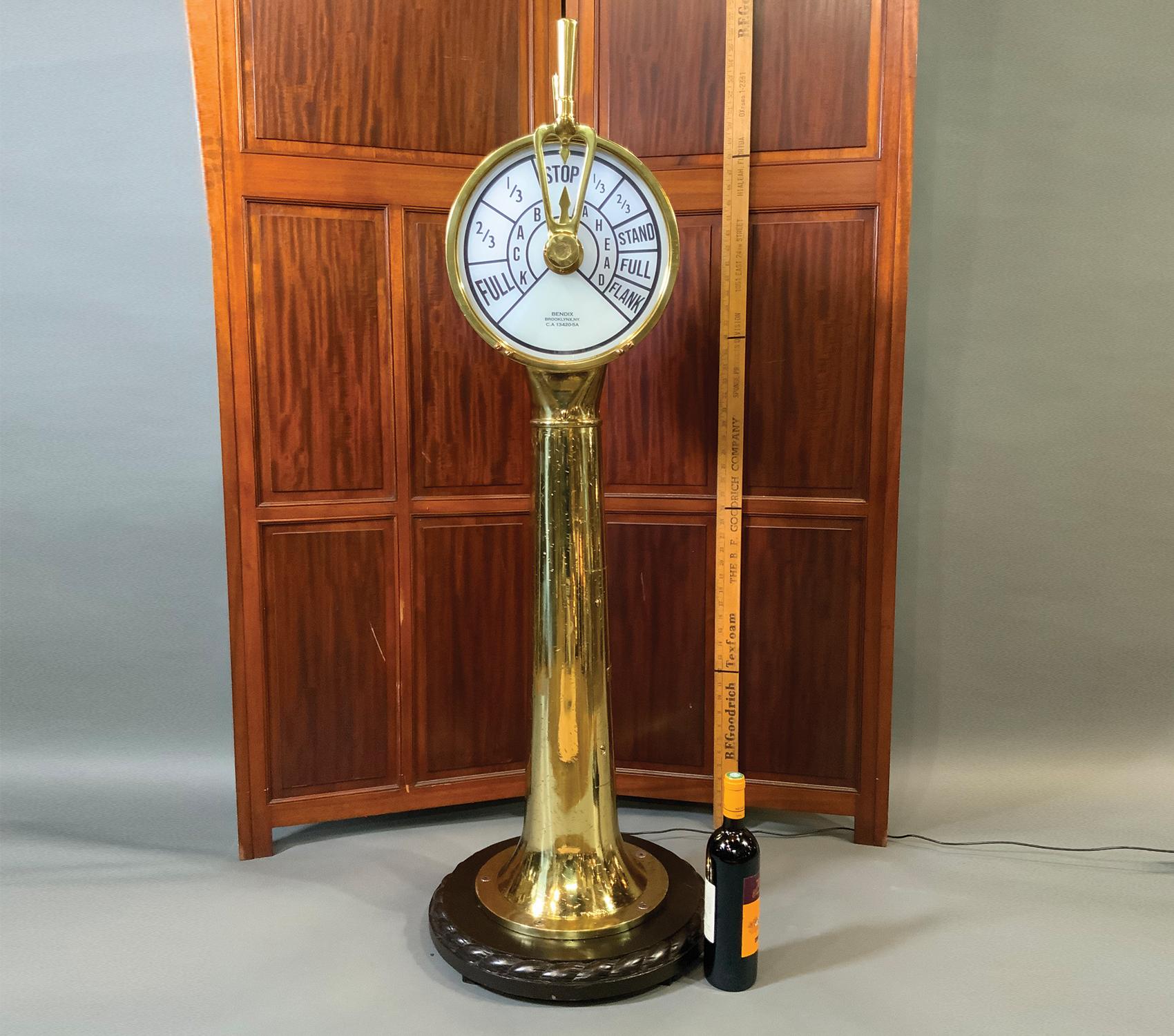 Solid brass ships engine order telegraph by American Maker Bendix. Twin face design with back and ahead commands. Fitted with 2 solid brass control handles. Copper tag on pedestal is engraved “Bendix Aviation Corporation- Marine Division, Brooklyn