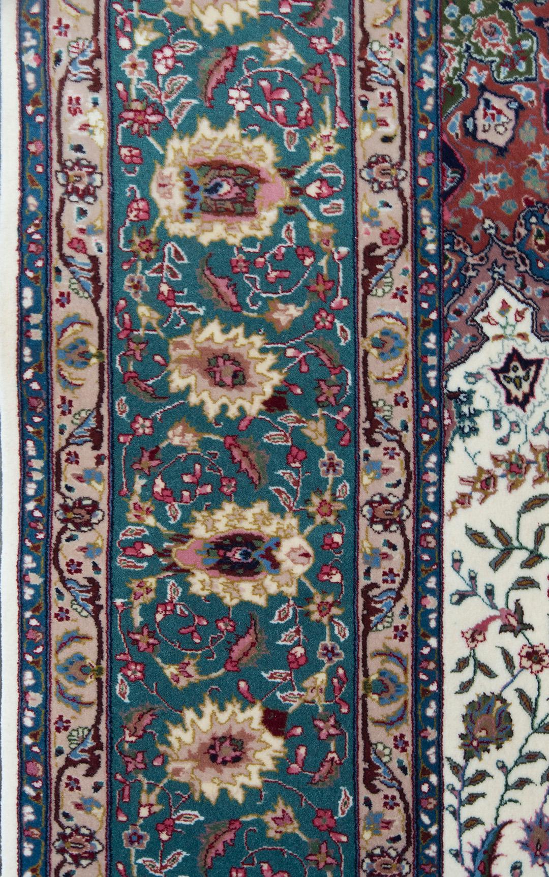 Brand new Tabriz from China woven by master weavers, this beautiful rug features an exceptional workmanship and a masterful color combination. 100% Fine natural wool pile.