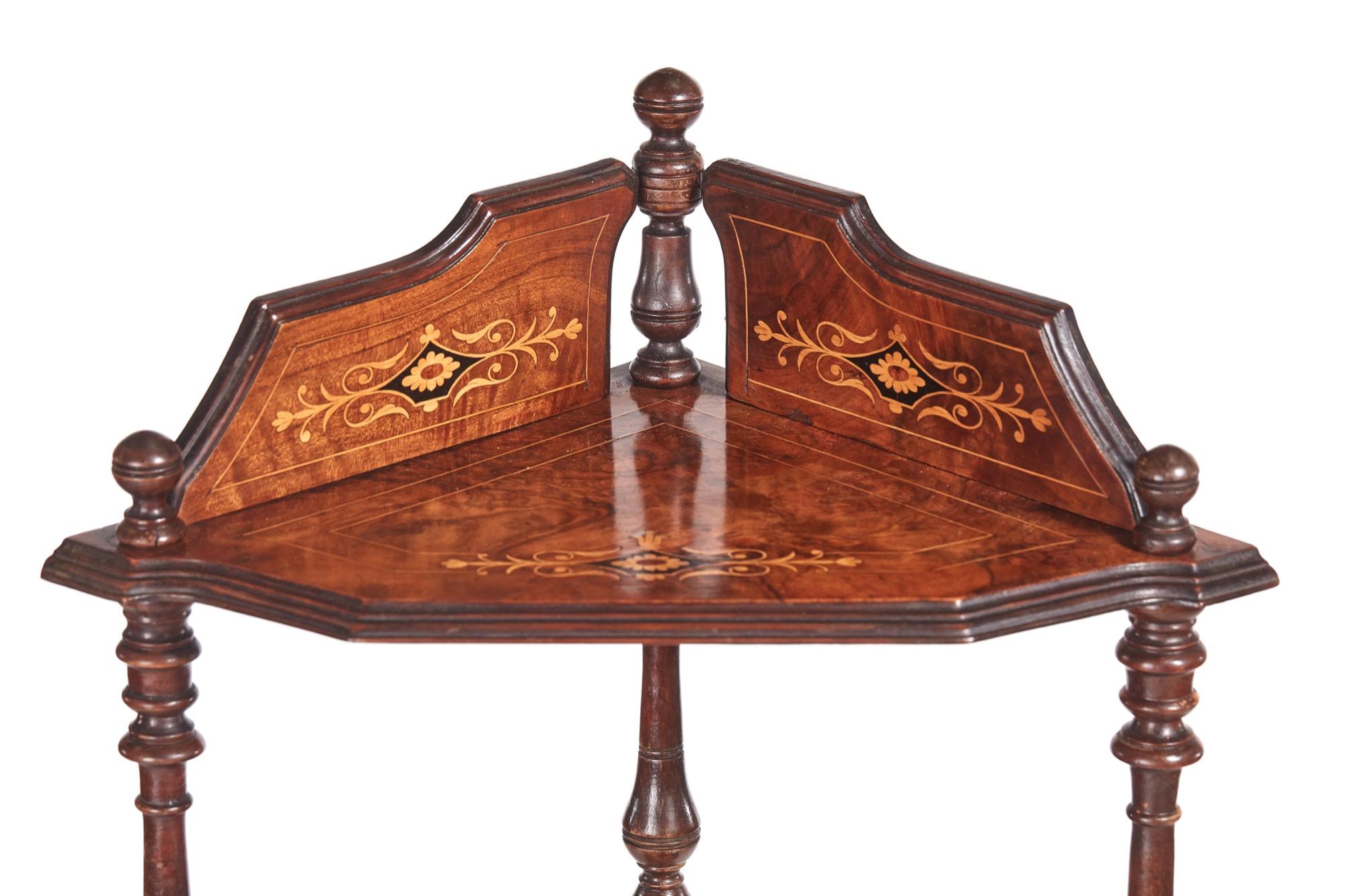 This is a quality 19th century Victorian antique inlaid burr walnut four-tier corner whatnot. It has a pretty shaped inlaid gallery back and three finials with a lovely burr walnut inlaid top, three inlaid burr walnut under-tiers supported by shaped