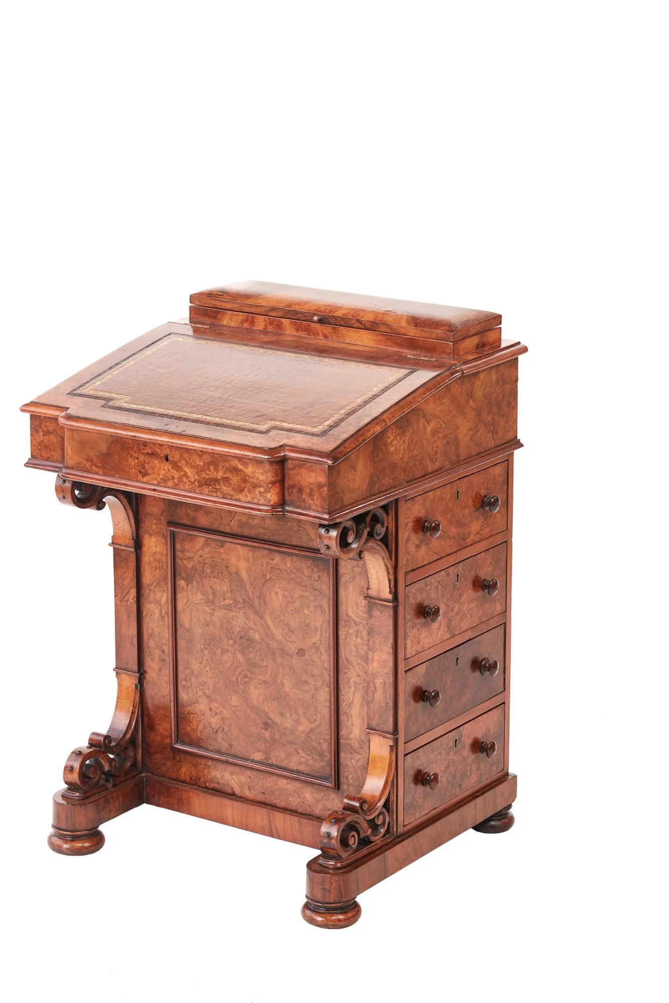 Quality Victorian burr walnut freestanding Davenport, lift up shaped lid with a fitted interior, carved shaped supports to the front, the right side has four drawers with original knobs, the left side has four false drawers with original knobs,