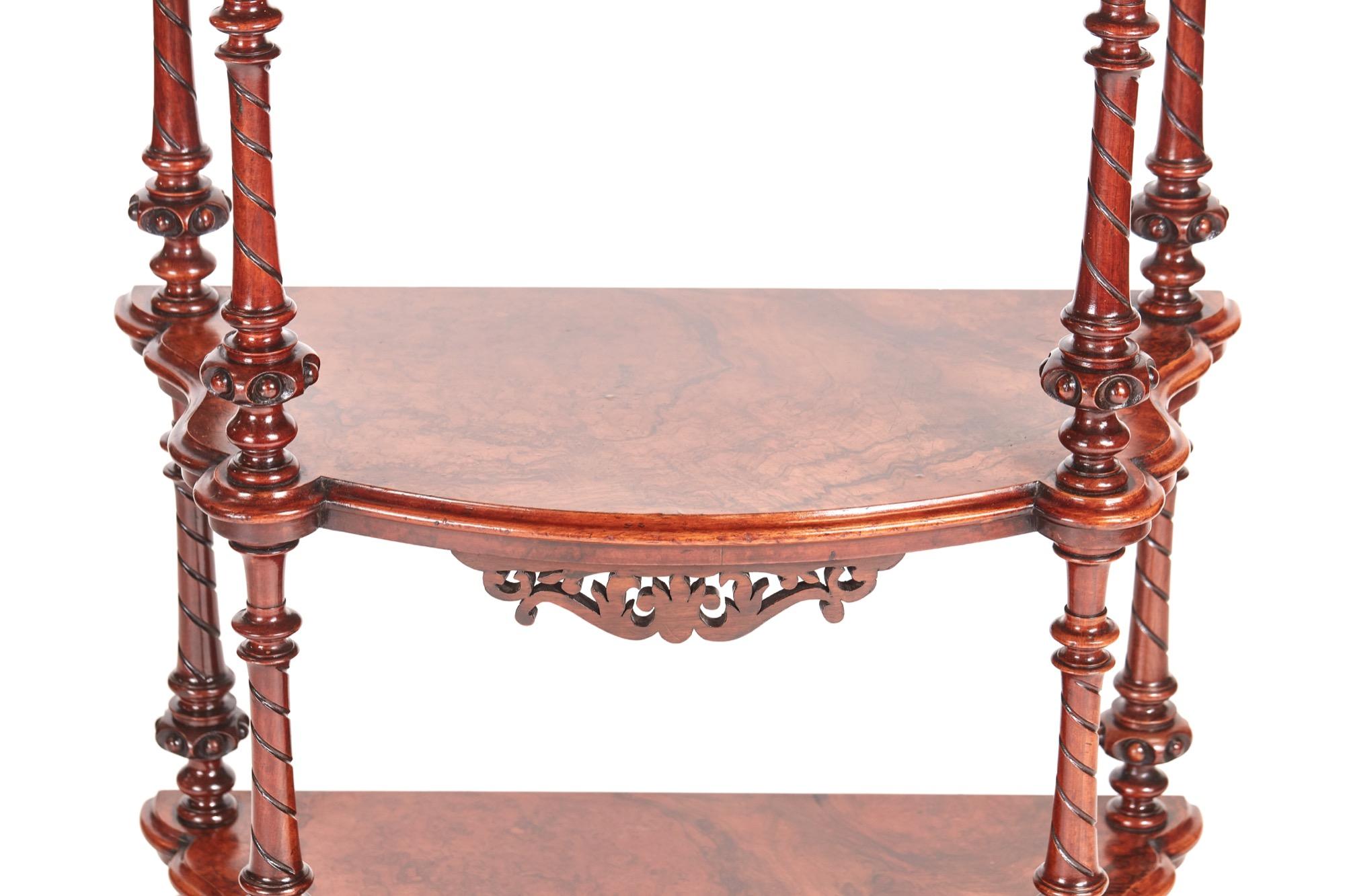 Quality Victorian burr walnut three-tier whatnot having a mirror back supported by attractive pierced solid walnut supports. It boasts a superior burr walnut shaped to and the burr walnut tiers have elegant shaped turned carved reeded supports. It
