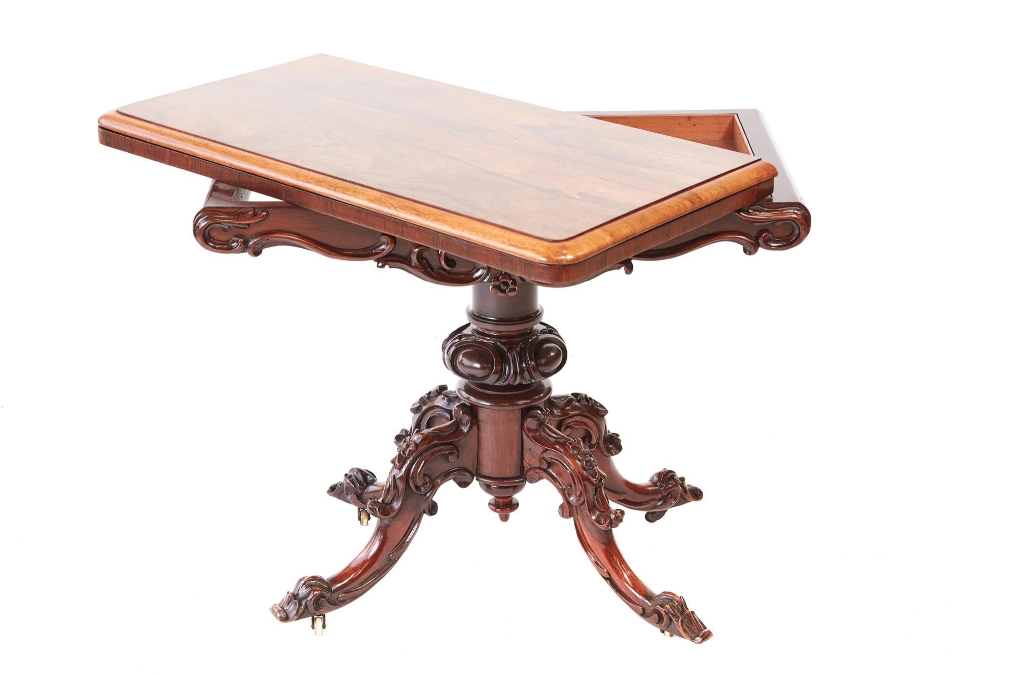 Quality Victorian carved rosewood card table. This splendid example has an attractive swivel hardwood top, green baize interior with an elegant shaped carefully carved frieze. The carved base is outstanding with a carved shaped column supported by