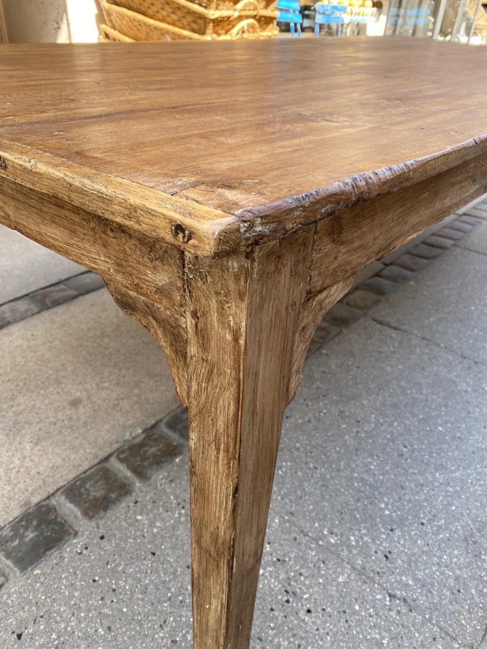 Delightfully large and solid vintage French long table with rustic charm and a lovely warm caramel colored patina. Originally from a restaurant / bistro in the south of France, where countless dinner meals have been served over the years.

An