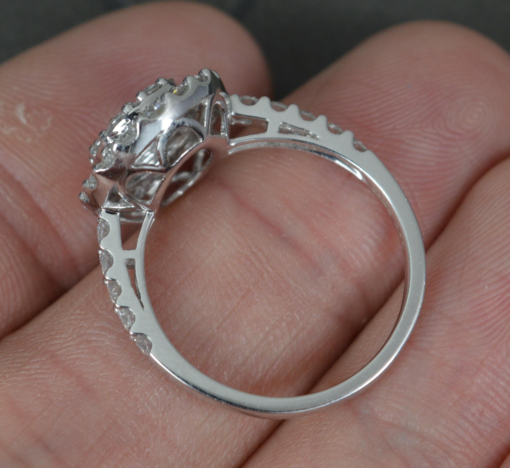 Quality Vs 1.25 Carat Diamond and 18 Carat White Gold Cluster Ring In Good Condition For Sale In St Helens, GB