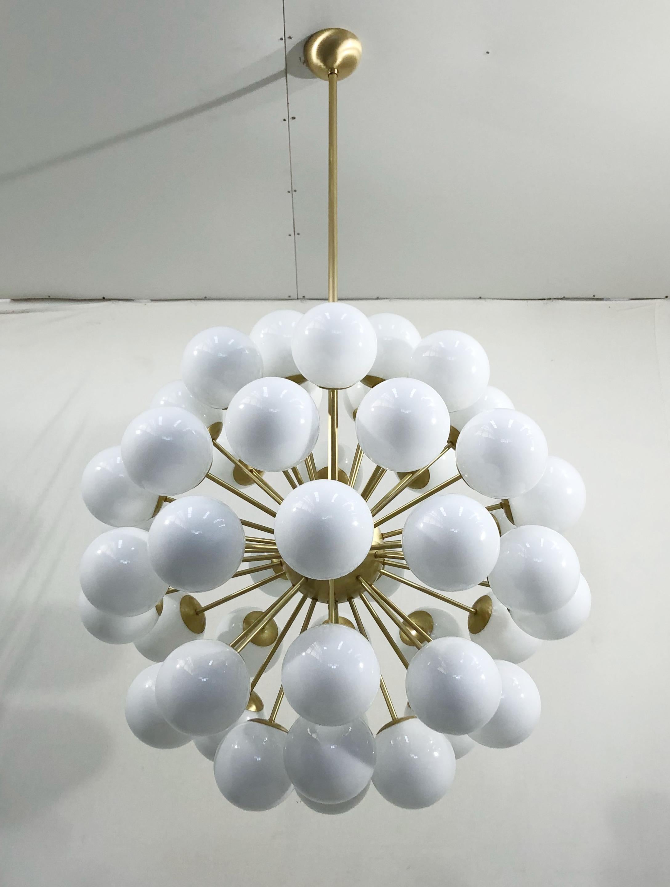 Italian sputnik chandelier with 48 Murano glass globes mounted on brass frame / Designed by Fabio Bergomi for Fabio Ltd / Made in Italy
48 lights / E12 or E14 type / max 40W each
Measures: diameter 38 inches / height 38 inches plus rod and