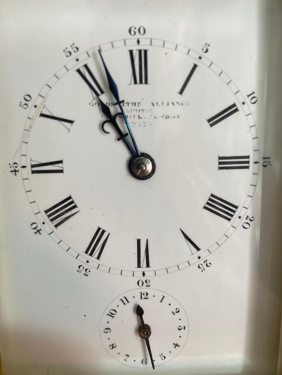 French Carriage Clock - With a rectangular white enamelled dial with Roman numerals and Arabic minutes above a subsidiary alarm dial, signed 'Goldsmiths Alliance Limited Cornhill, London, 2359' with a two train eight day movement with push button