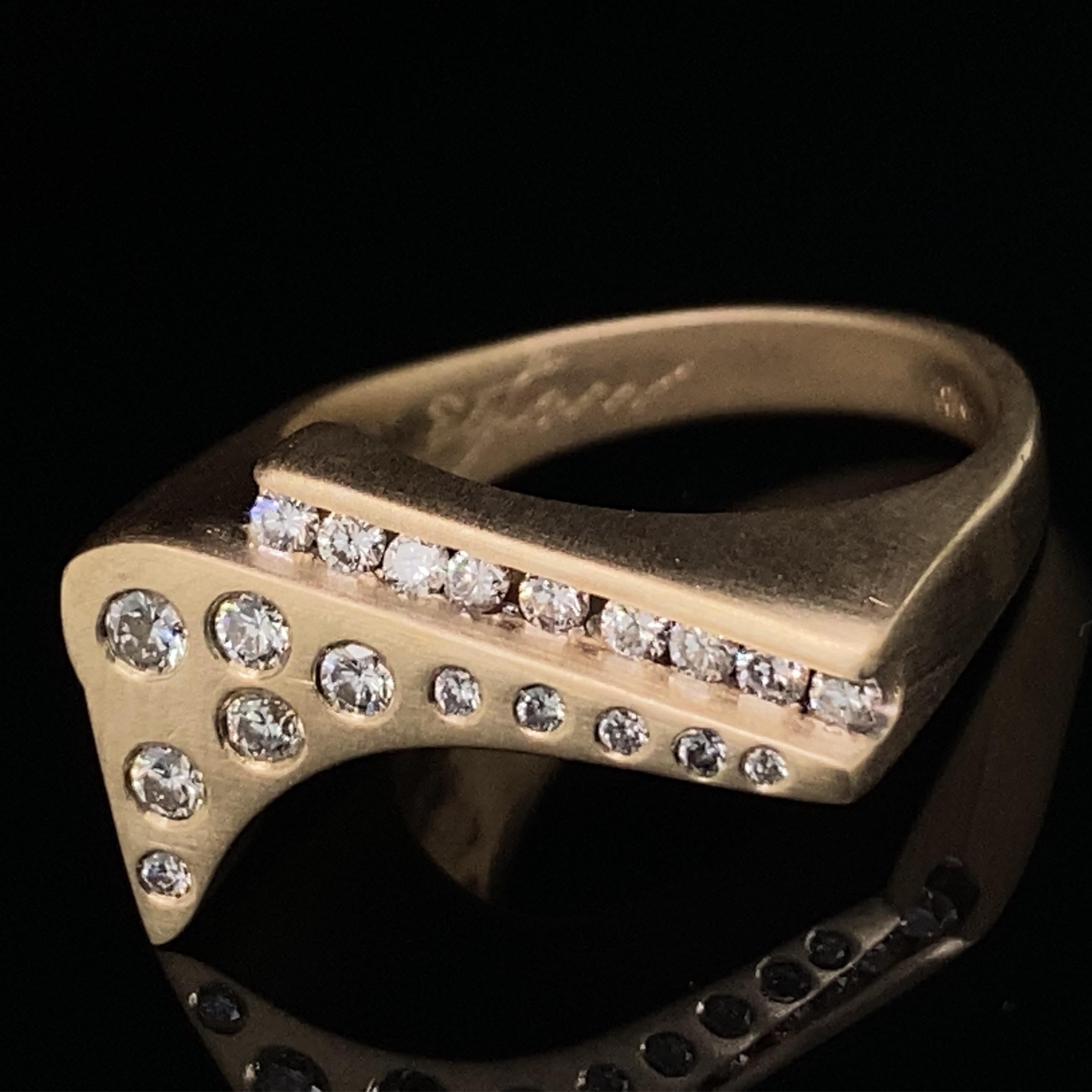 Eytan Brandes' Quarter Pipe ring combines a chaotic splash of flush-set diamonds and an orderly row of channel-set diamonds on a  modernist, eye-catching ring in satiny 18 karat yellow gold.

The twenty diamonds are all natural, earth-mined full cut