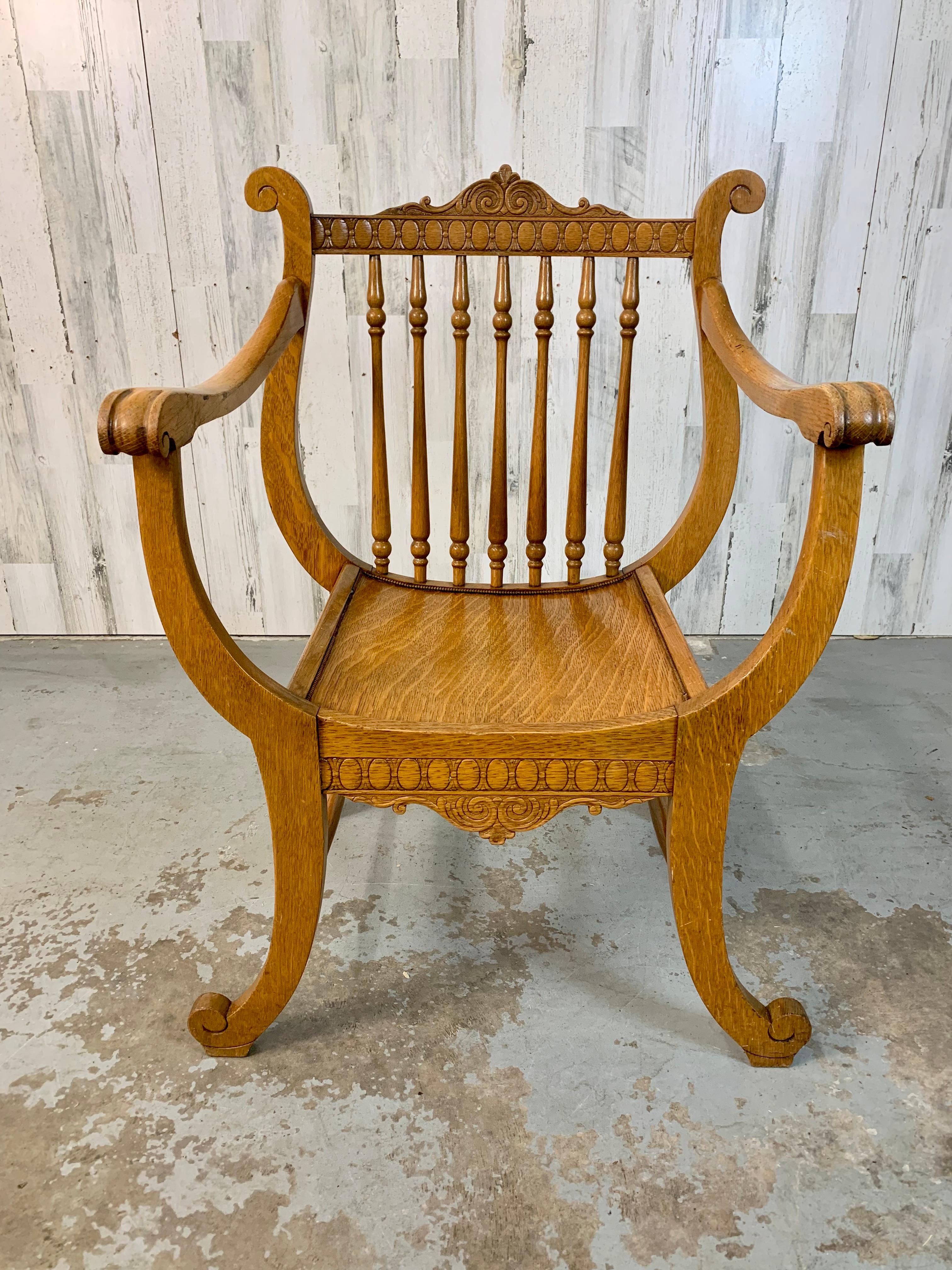 Beautiful quarter sawn oak hall chair in the Renaissance style with Lyre back and curved legs.
The sculptural presence of this chair make this a great accent for any room.