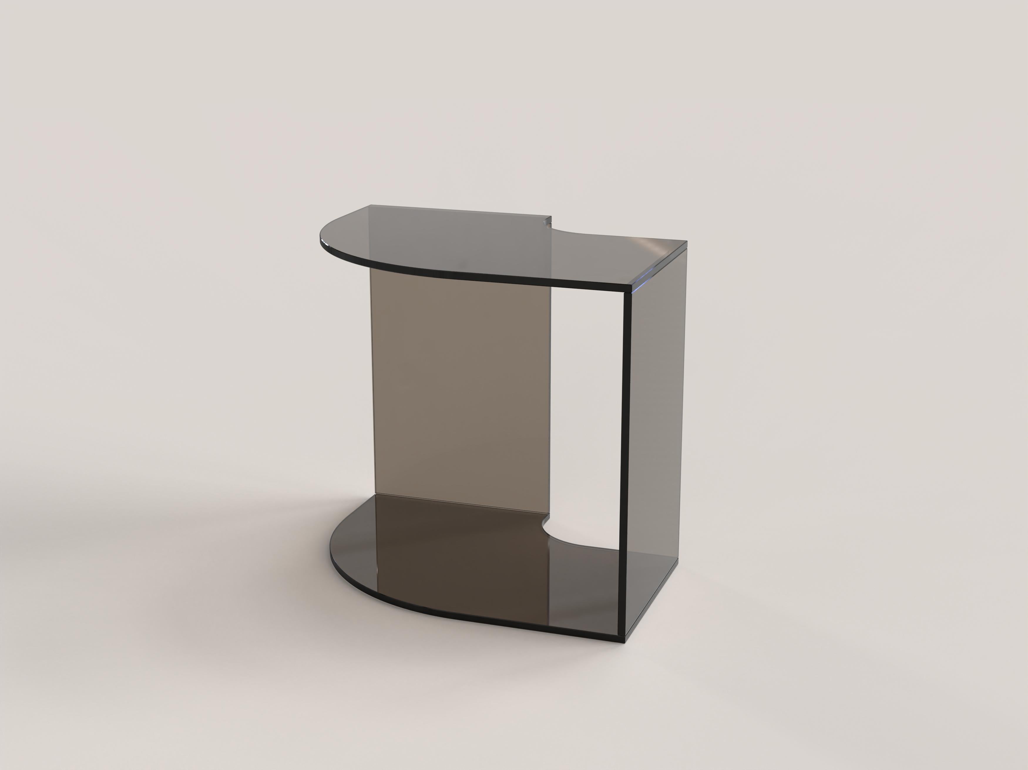 Quarter V1 Side Table by Edizione Limitata
Limited Edition of 1000 pieces. Signed and numbered.
Dimensions: D 45 x W 35 x H 41 cm.
Materials: Bronze tempered glass.

Quarter is a collection of contemporary side tables made by Italian artisans in