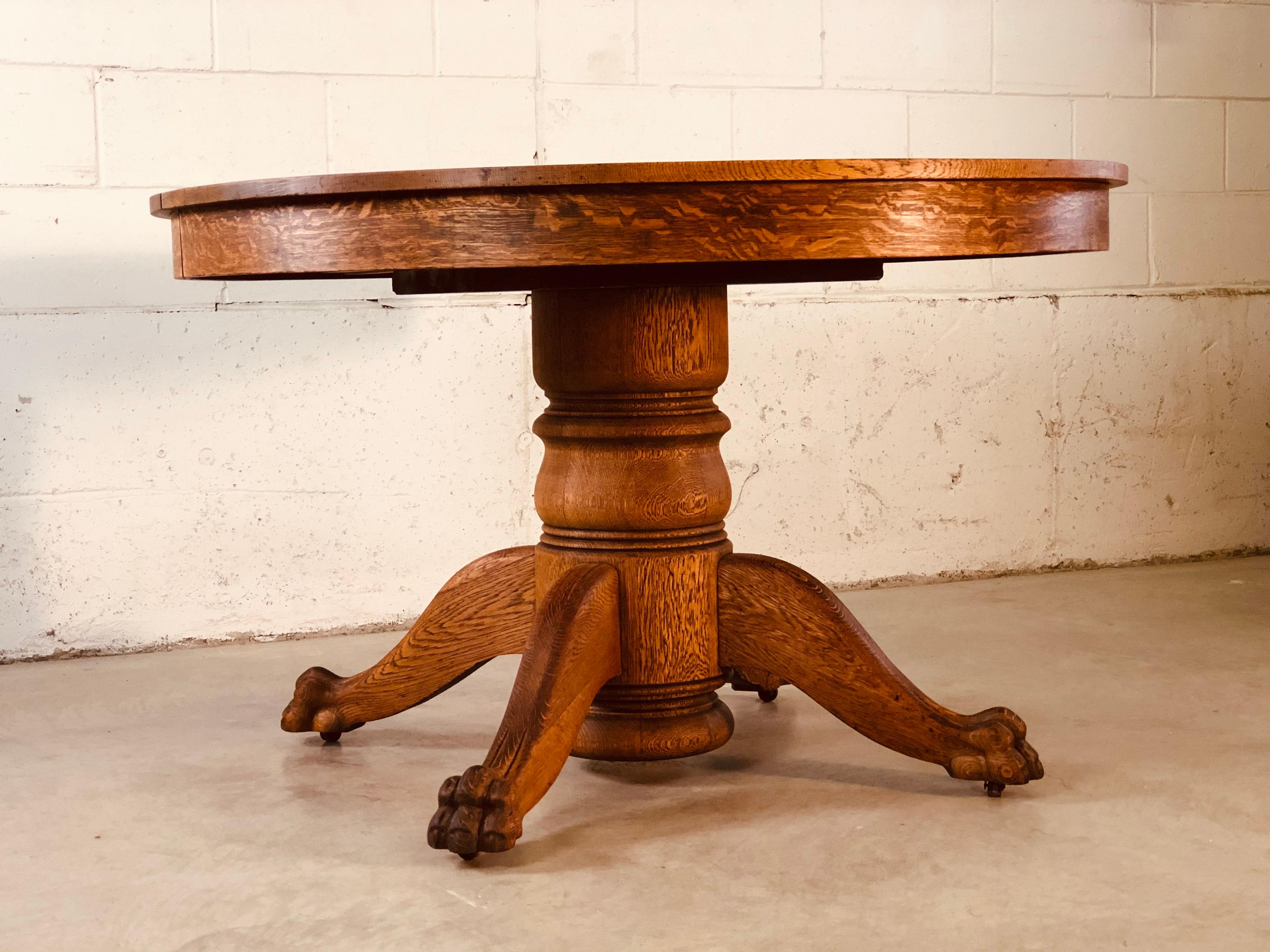 20th Century Quartersawn Oak Pedestal Claw Foot Table For Sale