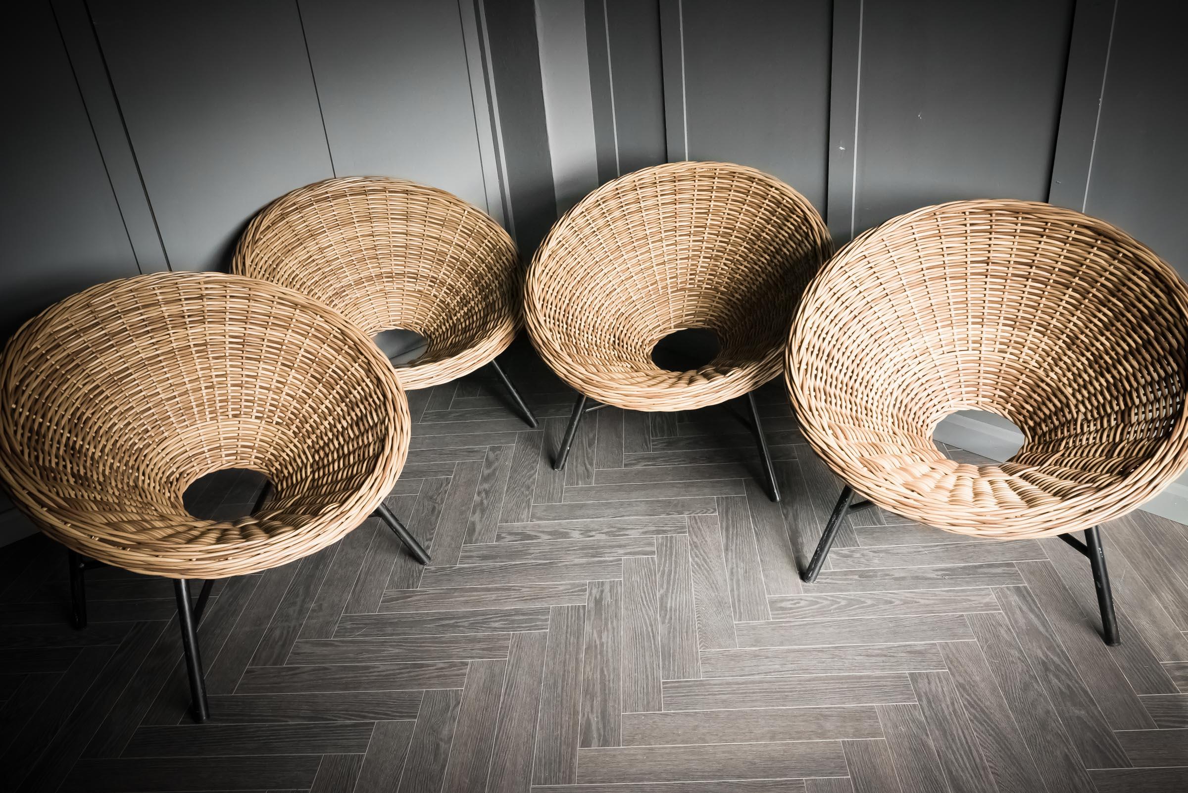 Quartet of Mid Century Wicker Tub Hole Chairs For Sale 4