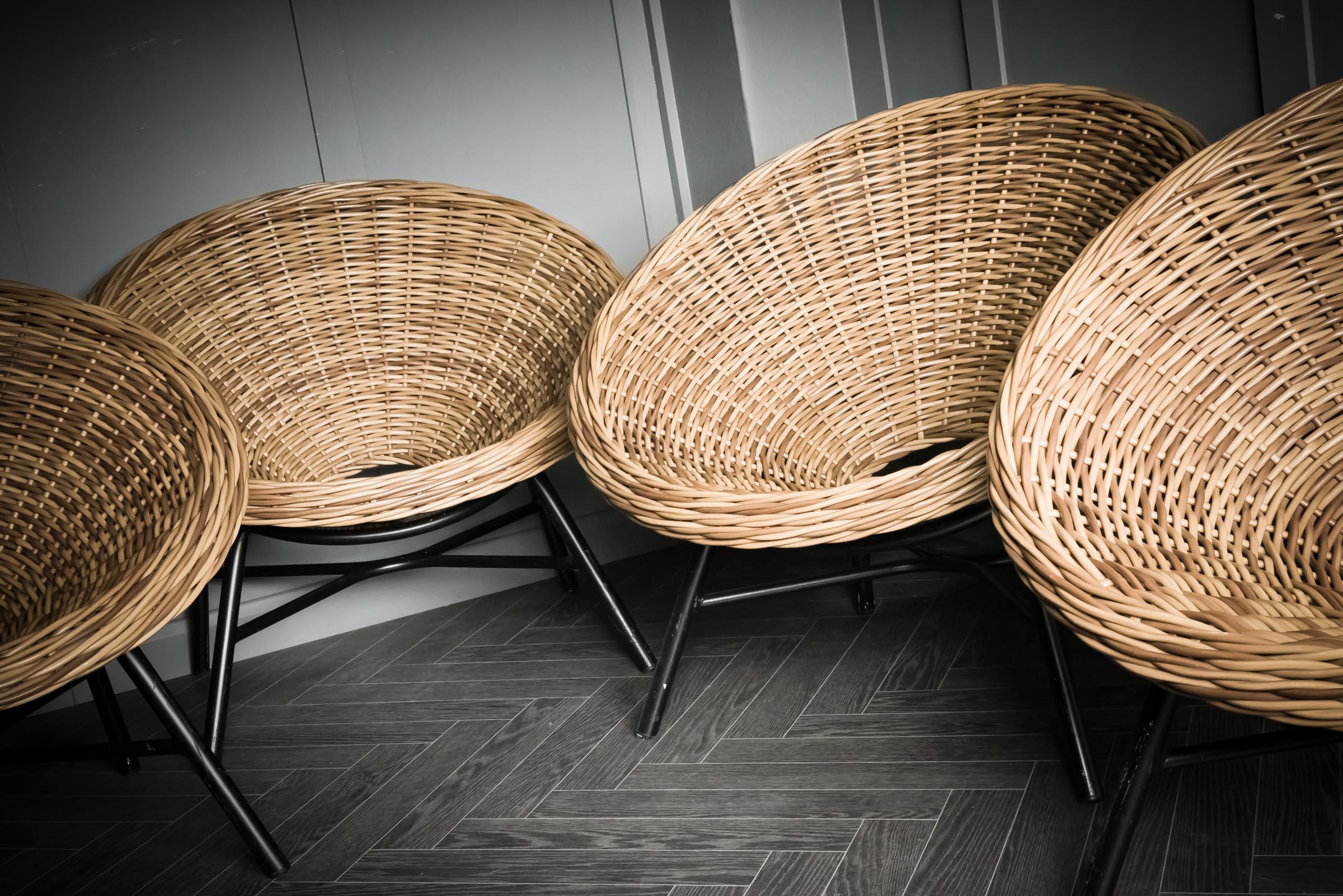 Quartet of Mid Century Wicker Tub Hole Chairs For Sale 2